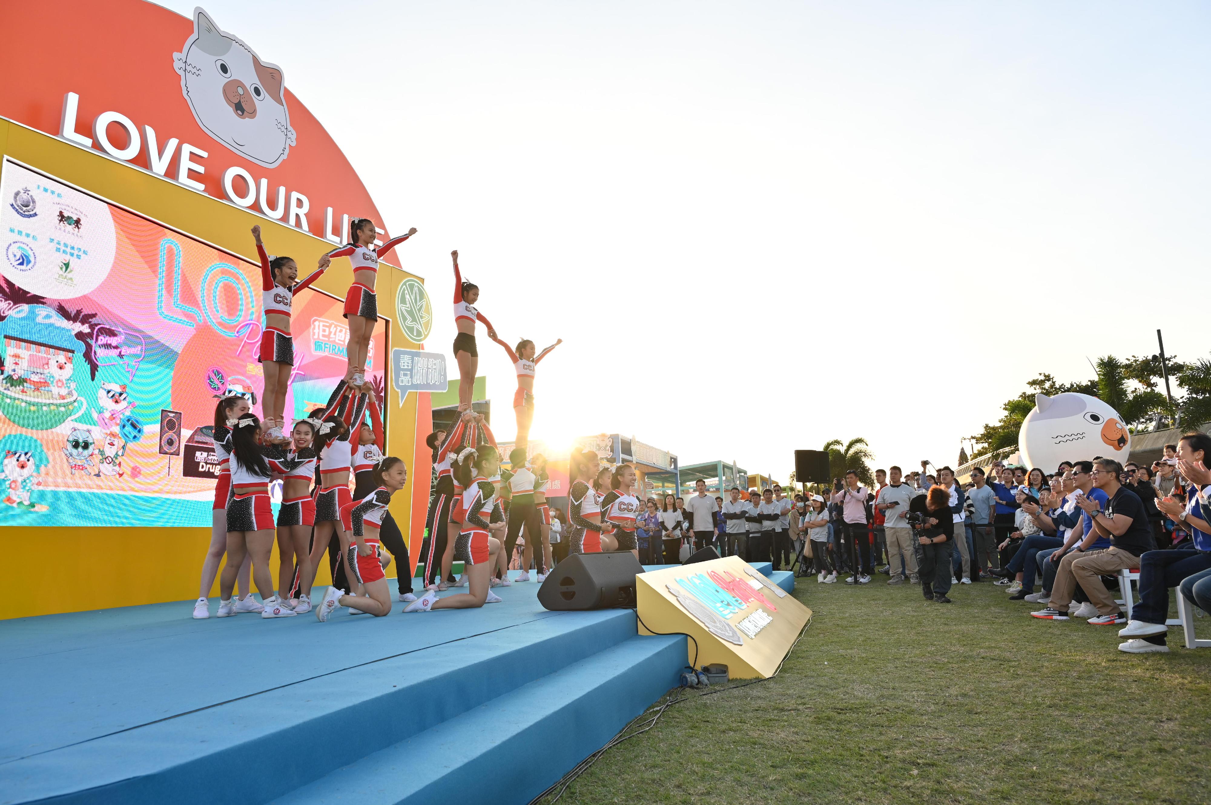 The Narcotics Bureau of the Hong Kong Police Force launched a large-scale anti-drug exhibition titled “Love Our Life – LOL Party 2023”, at the West Kowloon Cultural District from today (November 18) for two consecutive days. Photo shows a cheering performance at the opening ceremony.
