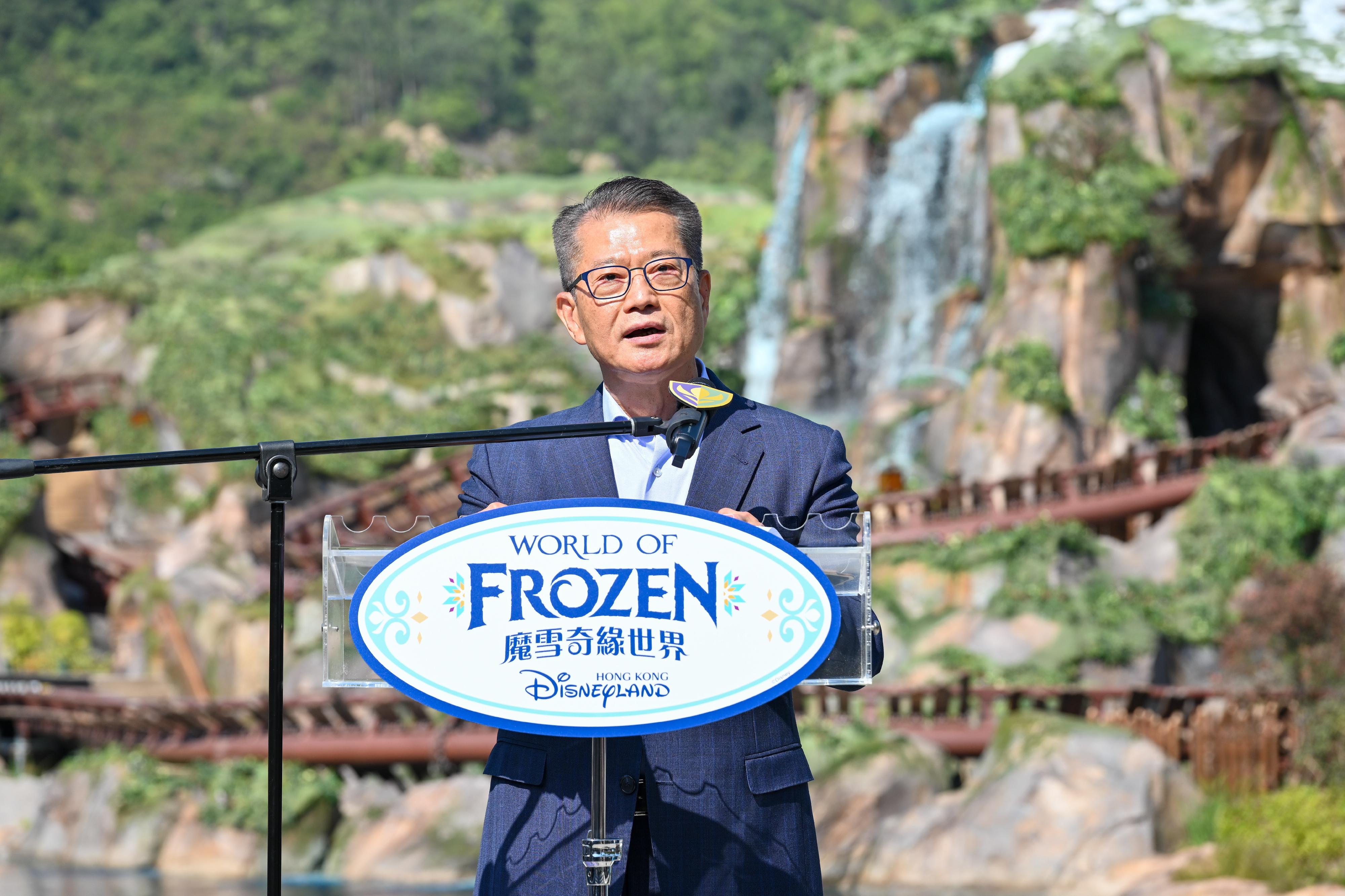 The Financial Secretary, Mr Paul Chan, speaks at the Hong Kong Disneyland Resort "A Welcome Ceremony for World of Frozen" today (November 20).