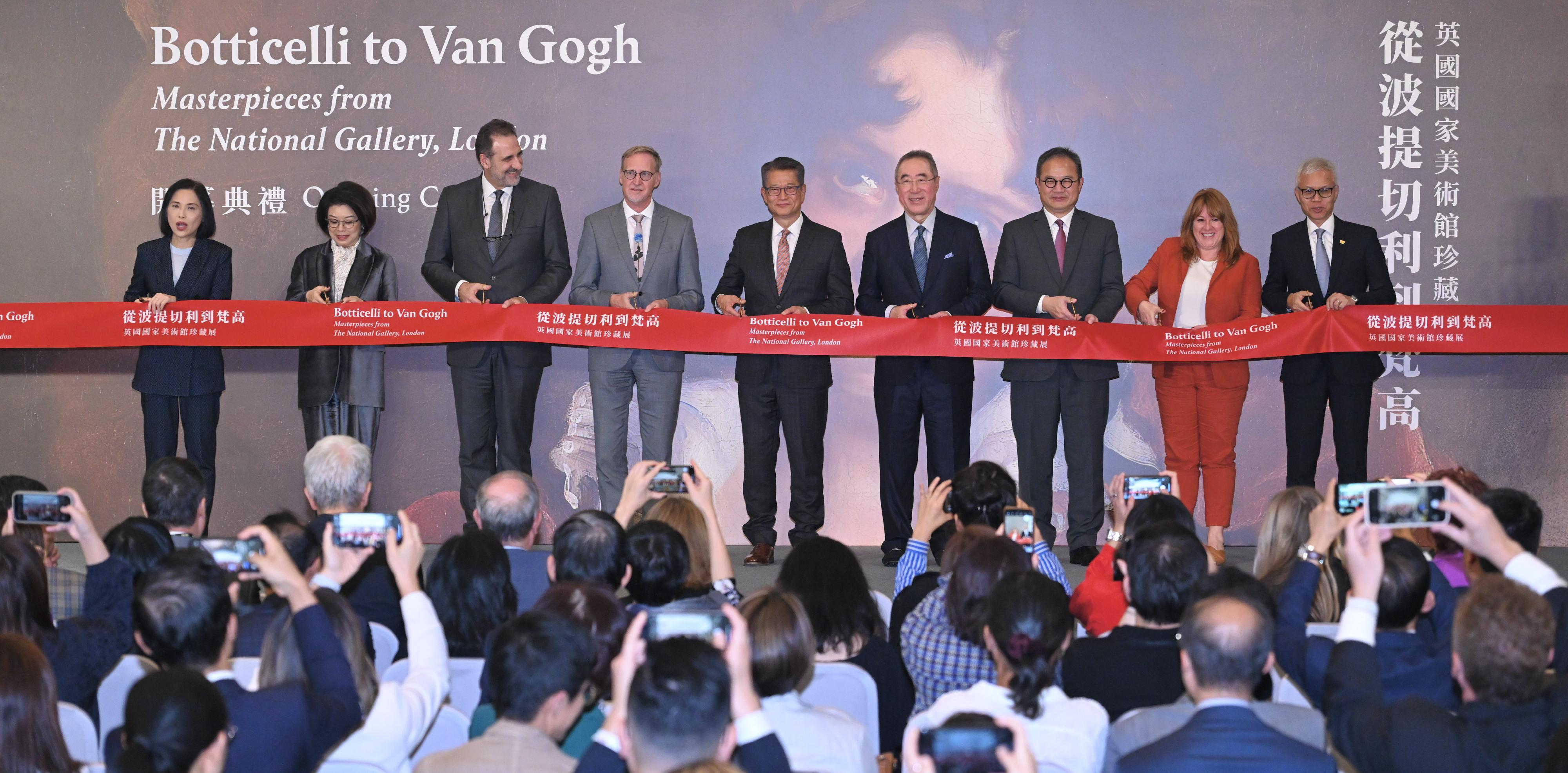 The Financial Secretary, Mr Paul Chan, attended the opening ceremony of the "Botticelli to Van Gogh: Masterpieces from the National Gallery, London" Special Exhibition today (November 21). Photo shows Mr Chan (centre); the British Consul General to Hong Kong and Macao, Mr Brian Davidson (fourth left); the Director of the National Gallery, London, Dr Gabriele Finaldi (third left); the Chairman of the Board of the West Kowloon Cultural District Authority (WKCDA), Mr Henry Tang (fourth right); the Chairman of the Board of the Hong Kong Palace Museum (HKPM), Ms Winnie Tam (second left); the Chief Executive Officer of the WKCDA, Mrs Betty Fung (first left); the Museum Director of the HKPM, Dr Louis Ng (first right), and other guests officiating at the ribbon-cutting ceremony.