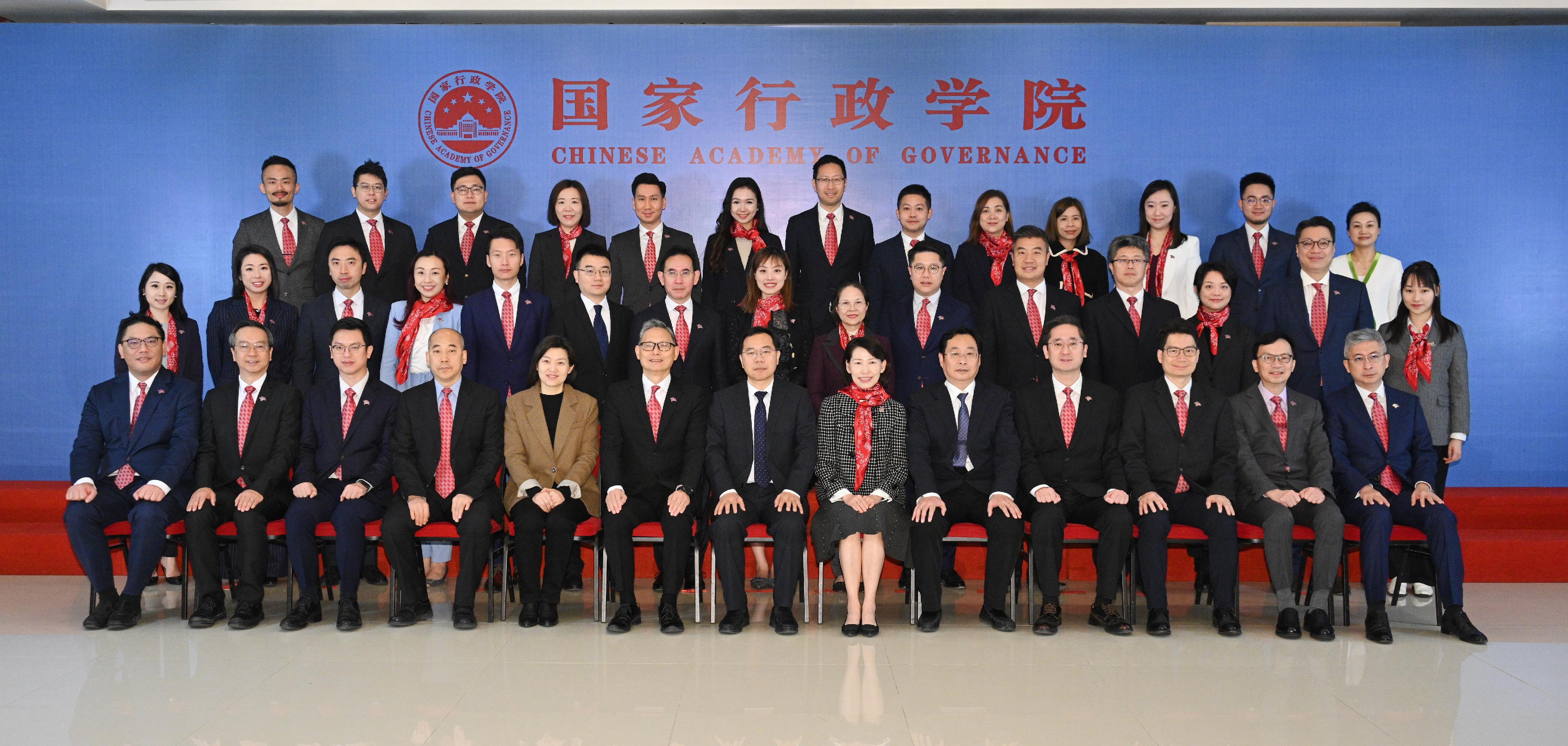 A delegation of politically appointed officials led by the Director of the Chief Executive's Office, Ms Carol Yip, began its national studies programme in Beijing yesterday (November 20) morning. Photo shows Deputy Director of the National Academy of Governance (NAG) Mr Li Wentang (front row, centre); the Director-General of the International and Hong Kong and Macau Training Center of the NAG, Mr Xie Yutong (front row, fifth right); Ms Yip (front row, sixth right); with the delegates at the programme's opening ceremony.