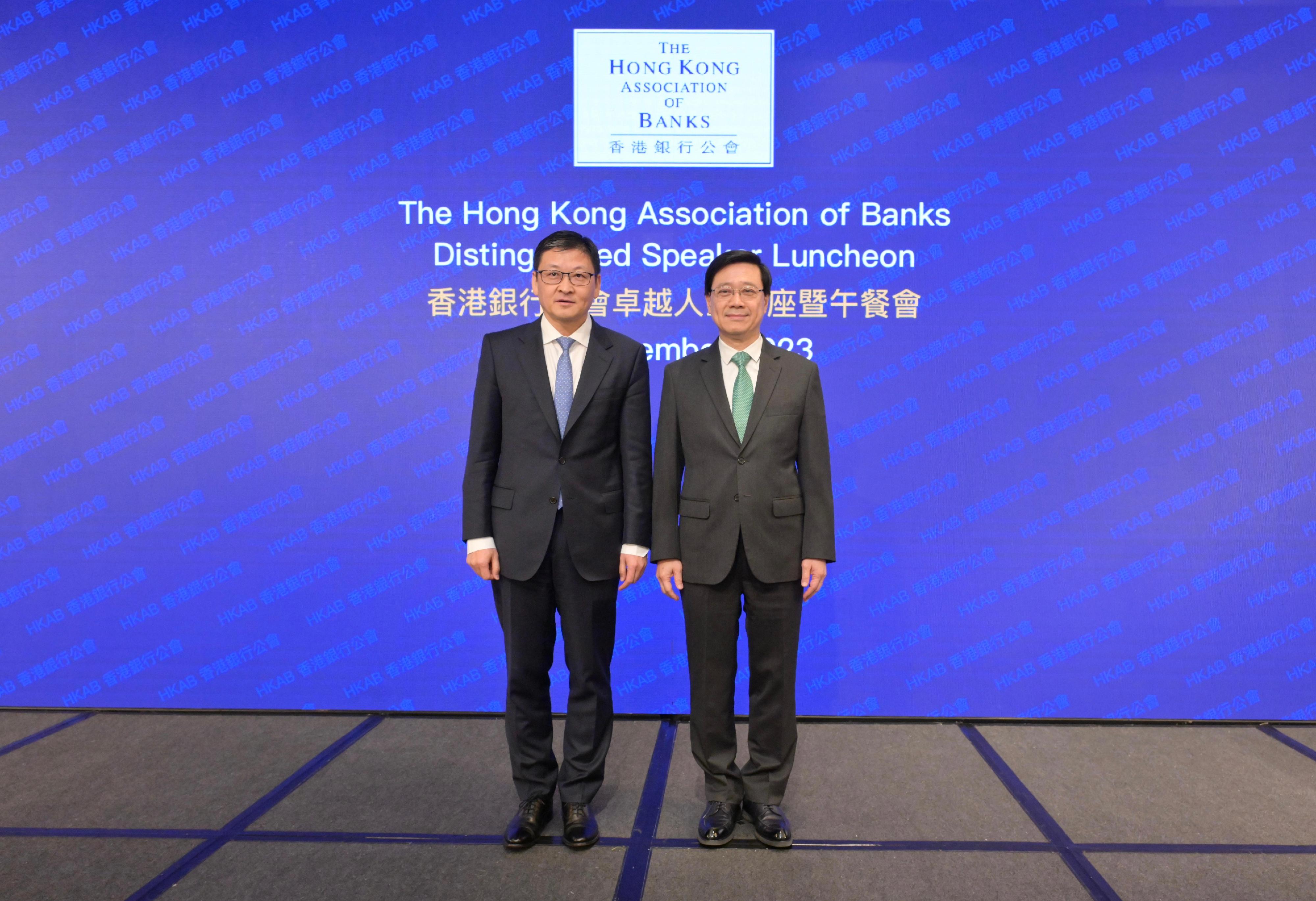 The Chief Executive, Mr John Lee, attended the Hong Kong Association of Banks (HKAB) Distinguished Speaker Luncheon today (November 24). Photo shows Mr Lee (right) with the Chairperson of the HKAB, Mr Sun Yu (left), at the luncheon.