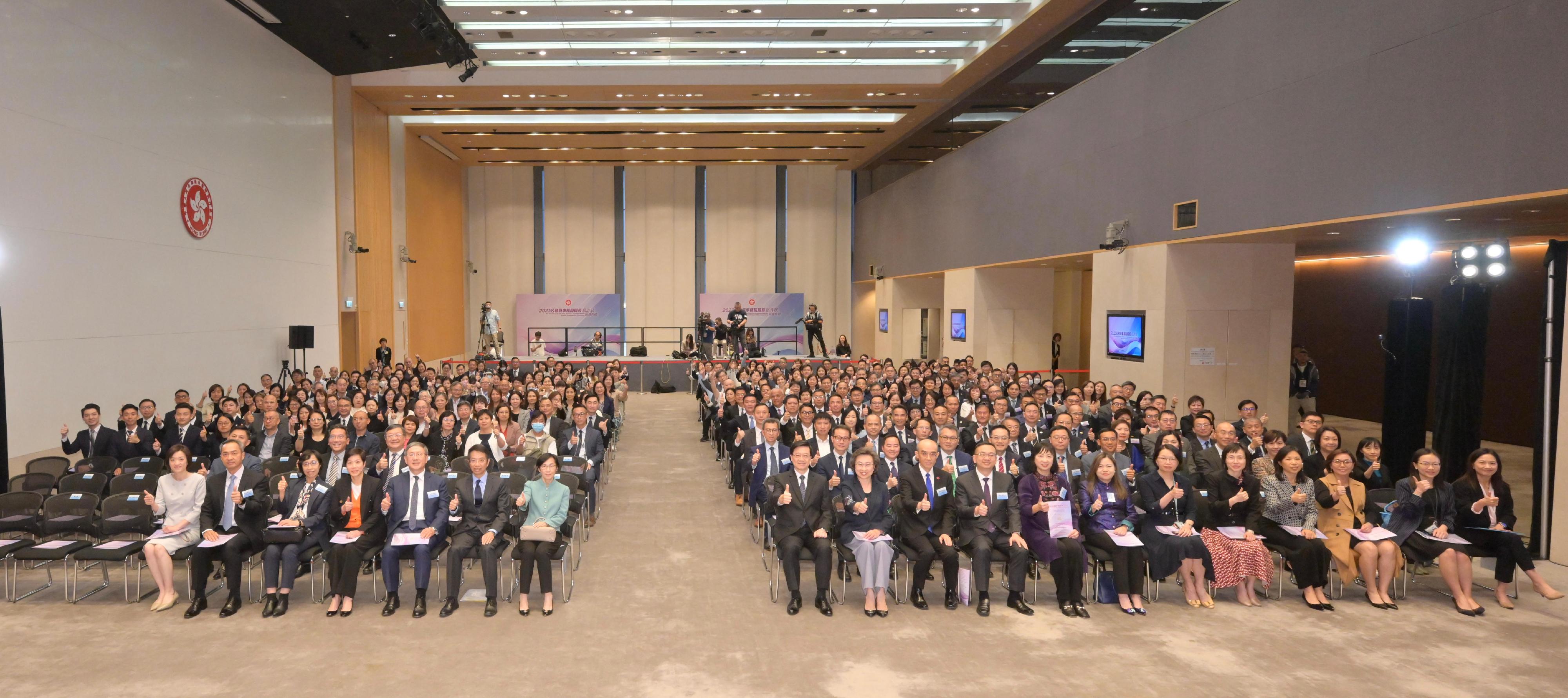 The Chief Executive, Mr John Lee, attended the Secretary for the Civil Service's Commendation Award Presentation Ceremony 2022 at the Central Government Offices today (November 28). Photo shows Mr Lee (first row, eighth left); the Secretary for the Civil Service, Mrs Ingrid Yeung (first row, ninth left); the Chairman of the Public Service Commission, Ms Maisie Cheng (first row, seventh left); the Permanent Secretary for the Civil Service, Mr Clement Leung (first row, sixth left); the Head of the Civil Service College, Mr Oscar Kwok (first row, second left), and about 50 Permanent Secretaries and Heads of Departments with award recipients.