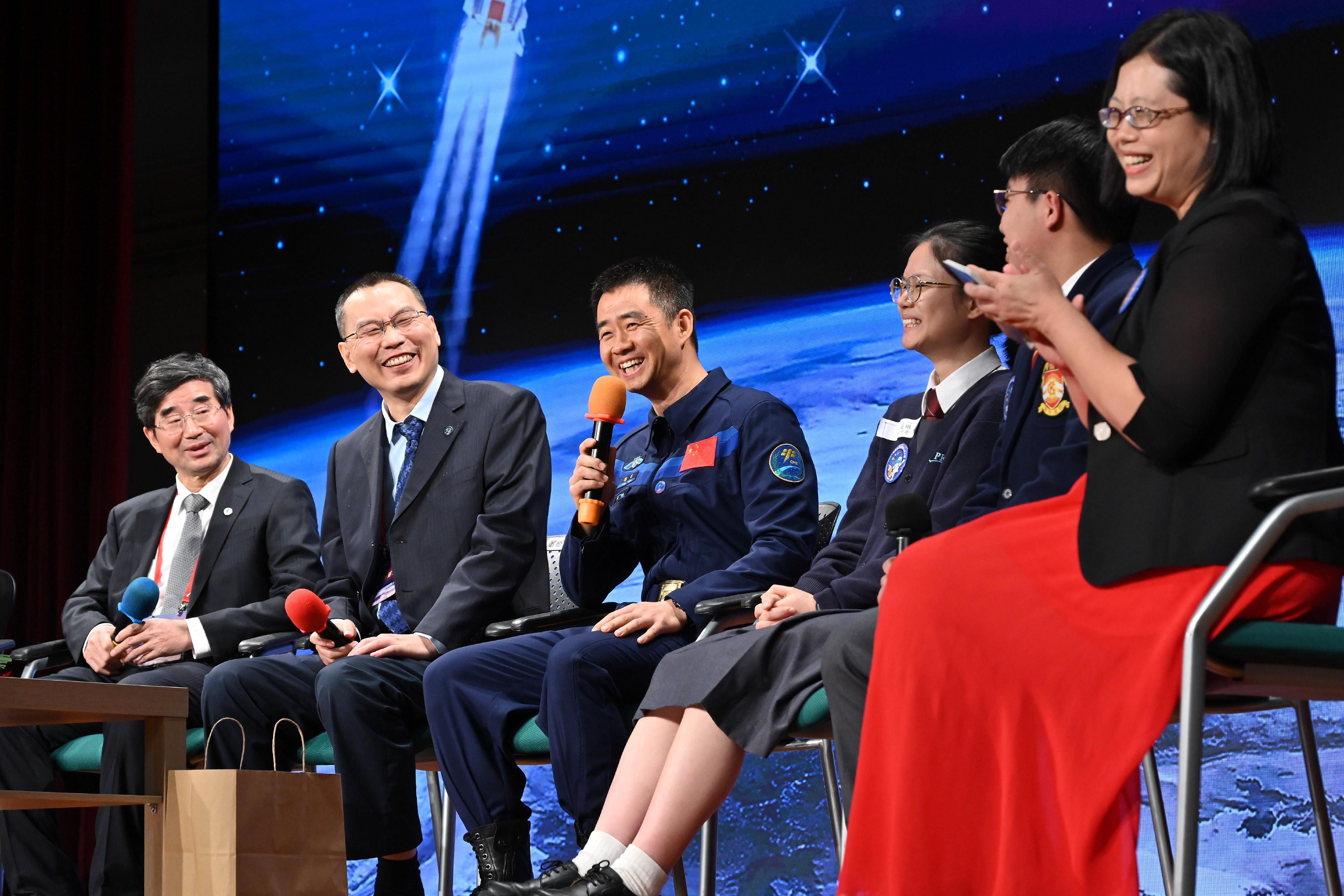 The China Manned Space delegation continued their visit in Hong Kong today (November 29). Photo shows (from left) delegation member Mr Gan Keli; Assistant Chief Designer of the China Manned Space Program Mr Dong Nengli; and Shenzhou-14 mission commander Mr Chen Dong, attending a dialogue session with students at Pui Kiu Middle School.