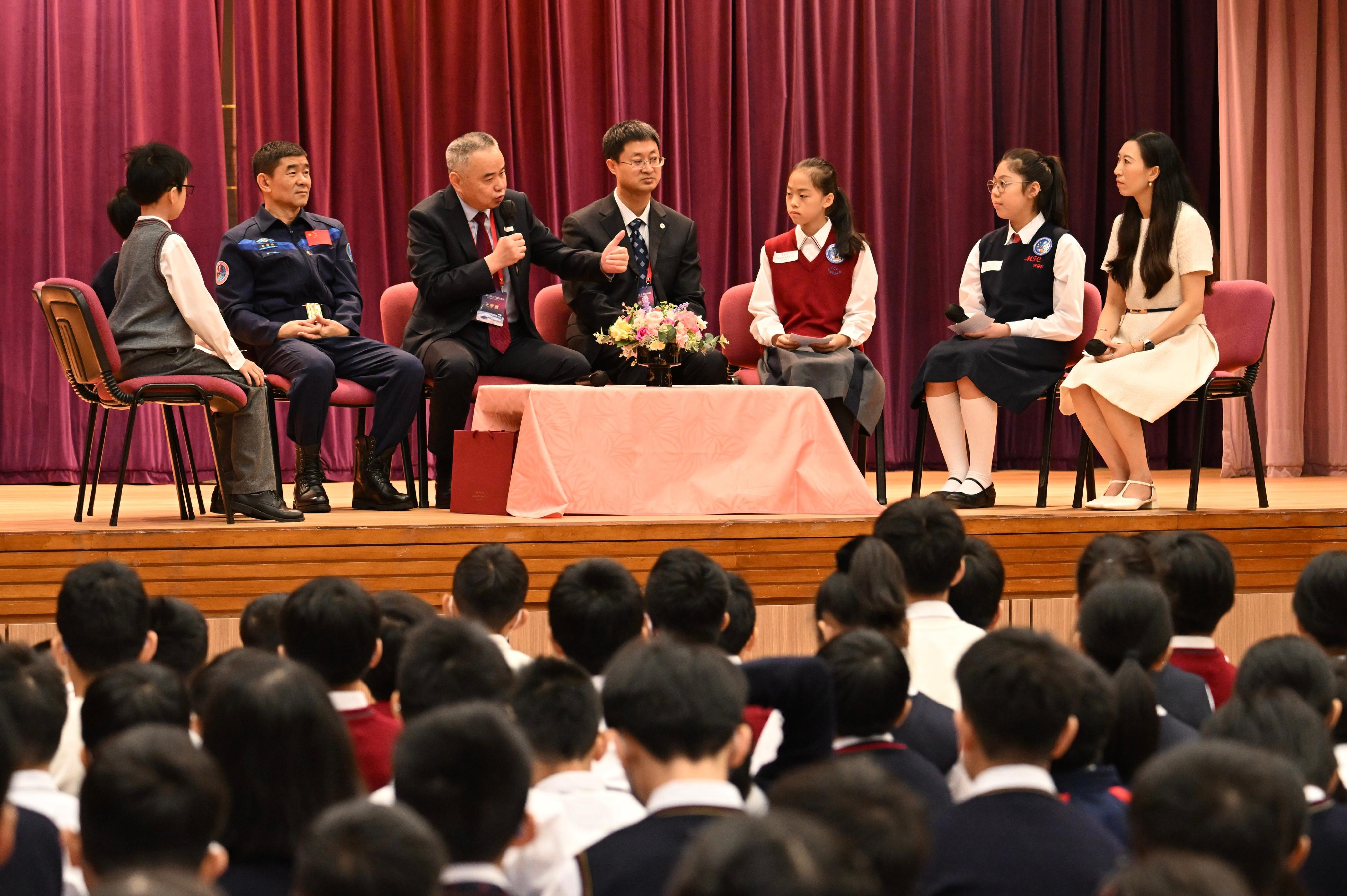 The China Manned Space delegation continued their visit in Hong Kong today (November 29). Photo shows (from second left) Shenzhou-12 astronaut Mr Liu Boming, and delegation members Mr Wang Xuewu and Mr Zhong Hongen, attending a dialogue session with students at Ma Tau Chung Government Primary School (Hung Hom Bay).