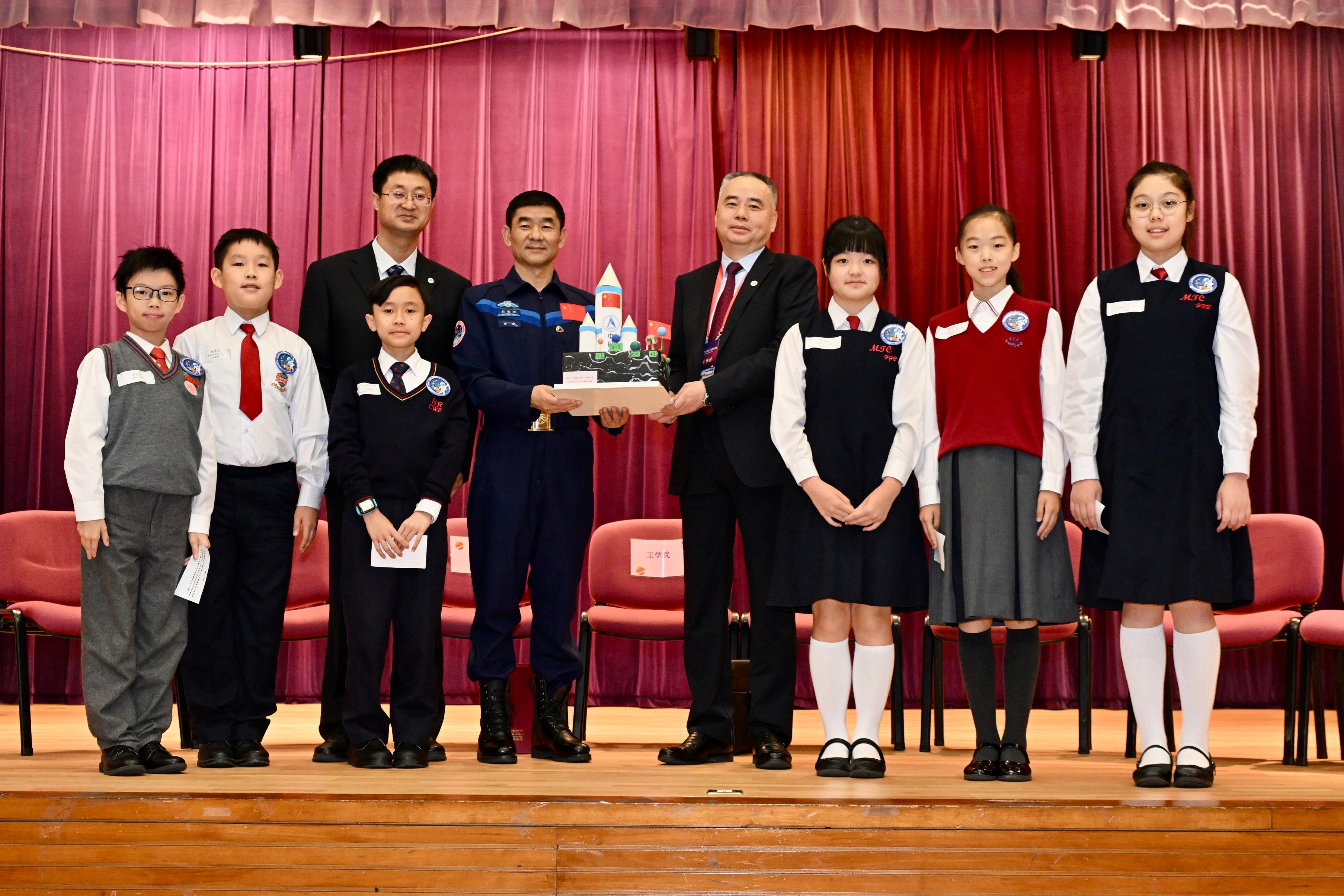 The China Manned Space delegation continued their visit in Hong Kong today (November 29). Photo shows (from fourth right) delegation member Mr Wang Xuewu, Shenzhou-12 astronaut Mr Liu Boming and delegation member Mr Zhong Hongen, attending a dialogue session with students at Ma Tau Chung Government Primary School (Hung Hom Bay).