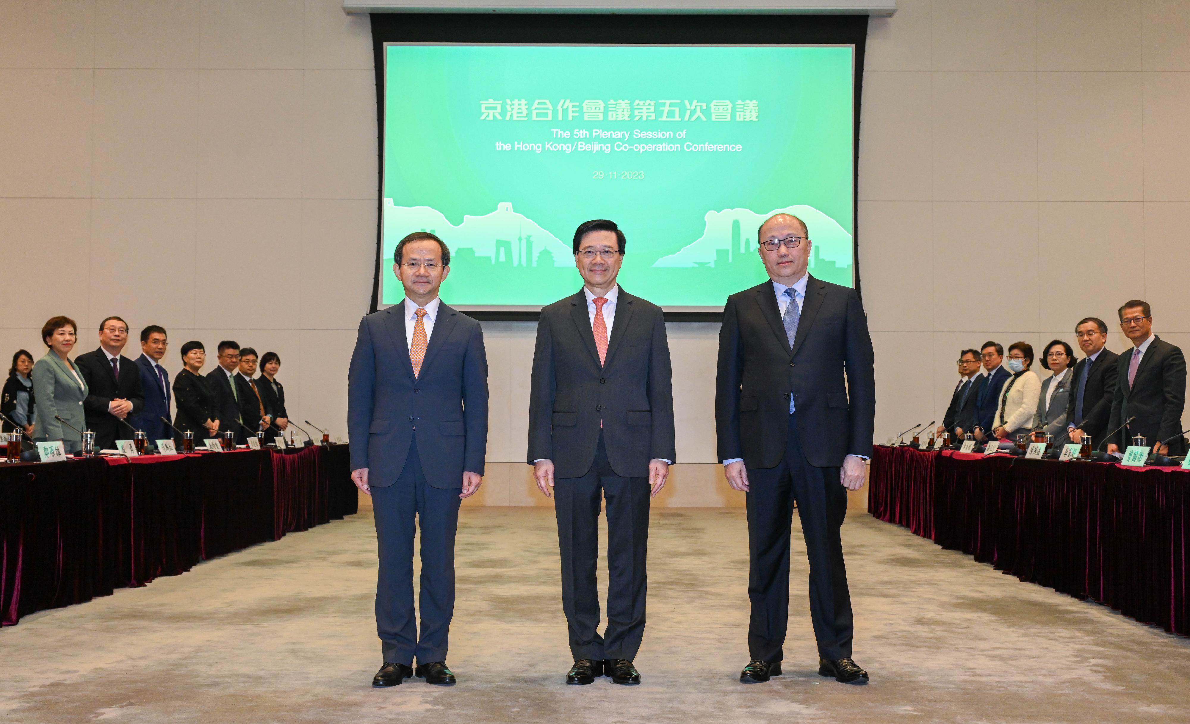The Chief Executive, Mr John Lee (centre), and the Mayor of Beijing, Mr Yin Yong (left), leading the delegations of the governments of Hong Kong Special Administrative Region (HKSAR) and Beijing respectively, held the Fifth Plenary Session of the Hong Kong/Beijing Co-operation Conference in Hong Kong today (November 29). Deputy Director of the Hong Kong and Macao Affairs Office of the State Council, Director of the Liaison Office of the Central People's Government in the HKSAR, Mr Zheng Yanxiong (right), also attended the plenary