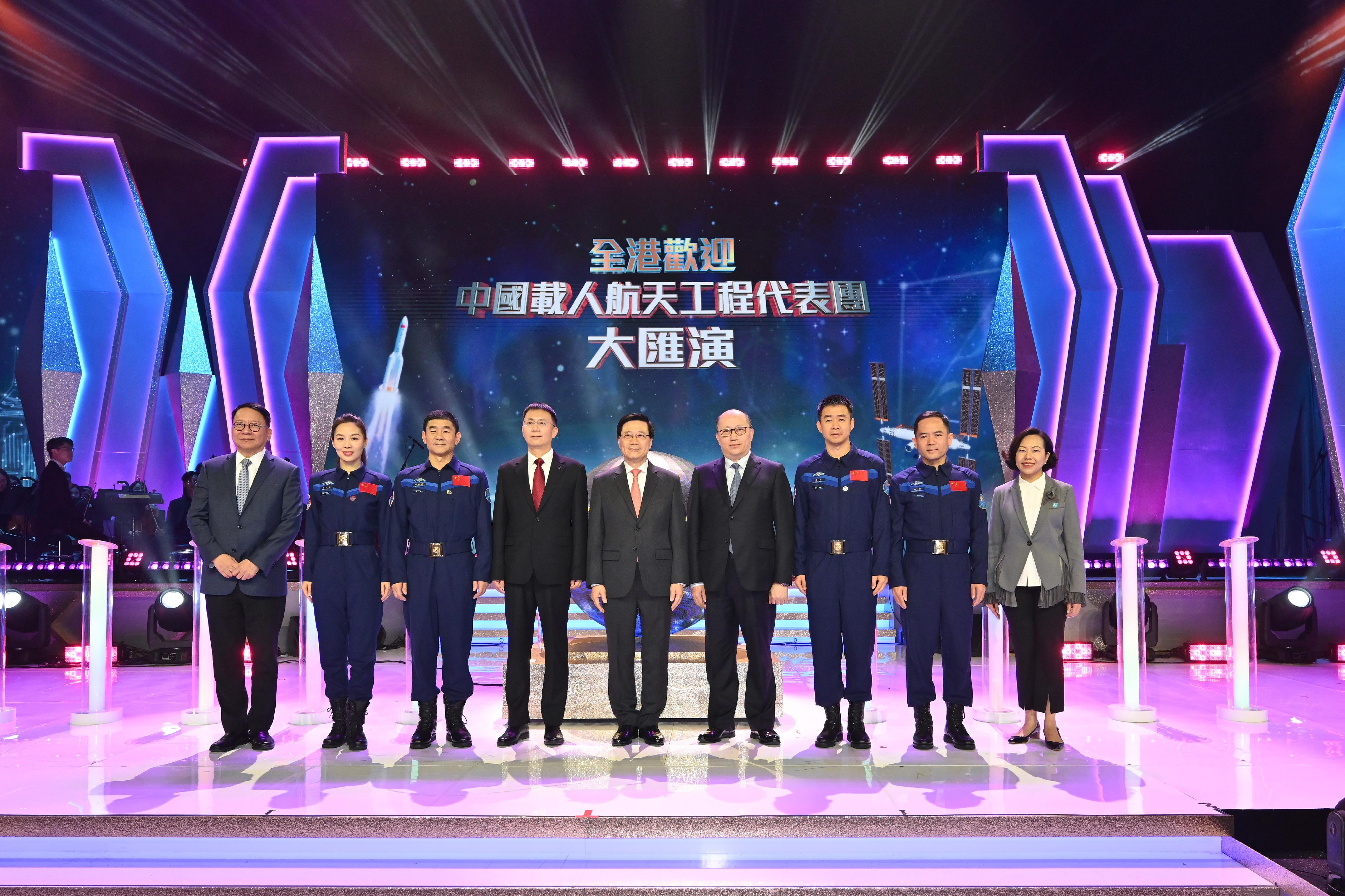 The China Manned Space delegation continued their visit to Hong Kong today (November 29) and attended the variety show that marked Hong Kong's welcoming of the China Manned Space delegation at the Hong Kong Coliseum. Photo shows (from left) the Chief Secretary for Administration, Mr Chan Kwok-ki; Shenzhou-13 astronaut Ms Wang Yaping; Shenzhou-12 astronaut Mr Liu Boming; the leader of the delegation and Deputy Director General of the China Manned Space Agency, Mr Lin Xiqiang; the Chief Executive, Mr John Lee; the Director of the Liaison Office of the Central People's Government in the Hong Kong Special Administrative Region, Mr Zheng Yanxiong; Shenzhou-14 mission commander Mr Chen Dong; Shenzhou-15 astronaut Mr Zhang Lu; and the Secretary for Home and Youth Affairs, Miss Alice Mak, at the variety show.