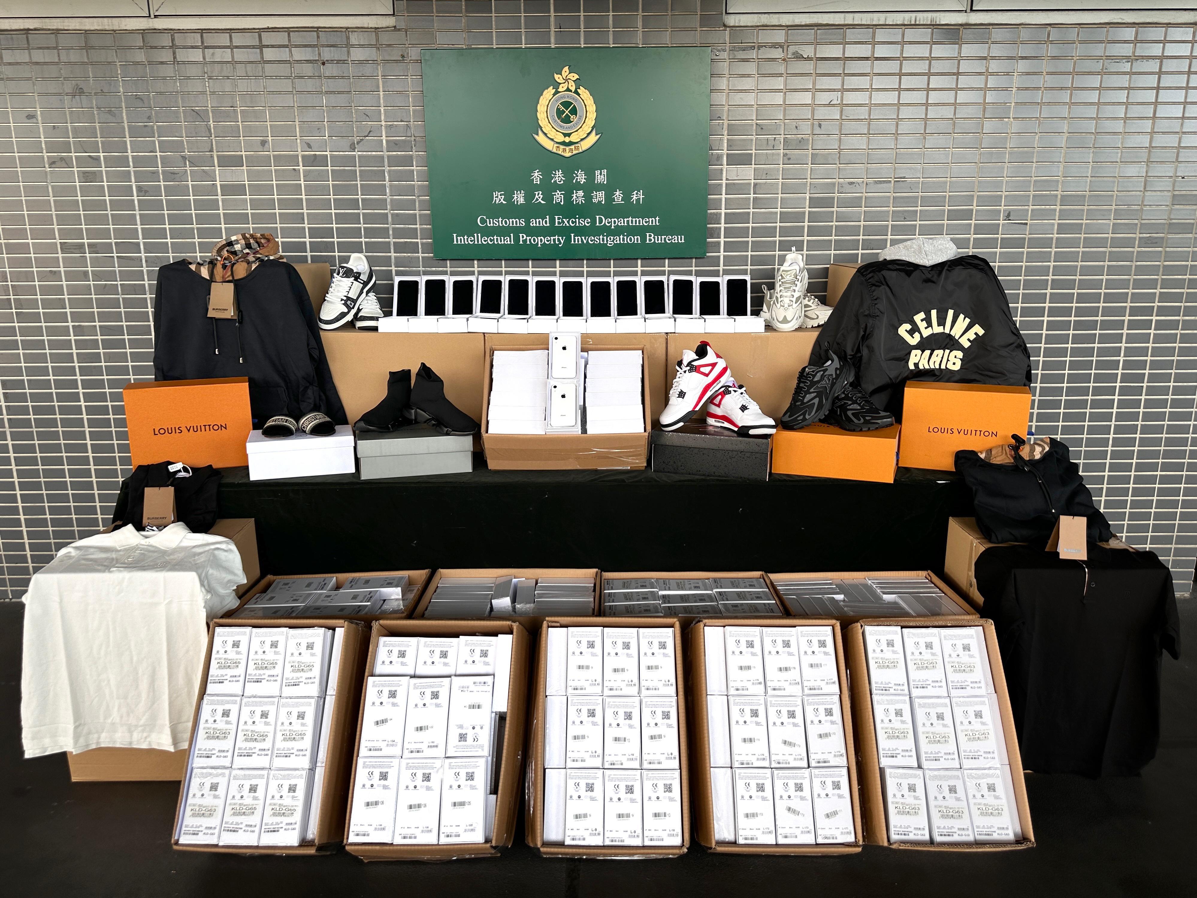 Hong Kong Customs on November 21 seized about 850 suspected counterfeit goods with a total estimated market value of about $1.2 million at the Shenzhen Bay Control Point. Photo shows some of the suspected counterfeit goods seized. 
