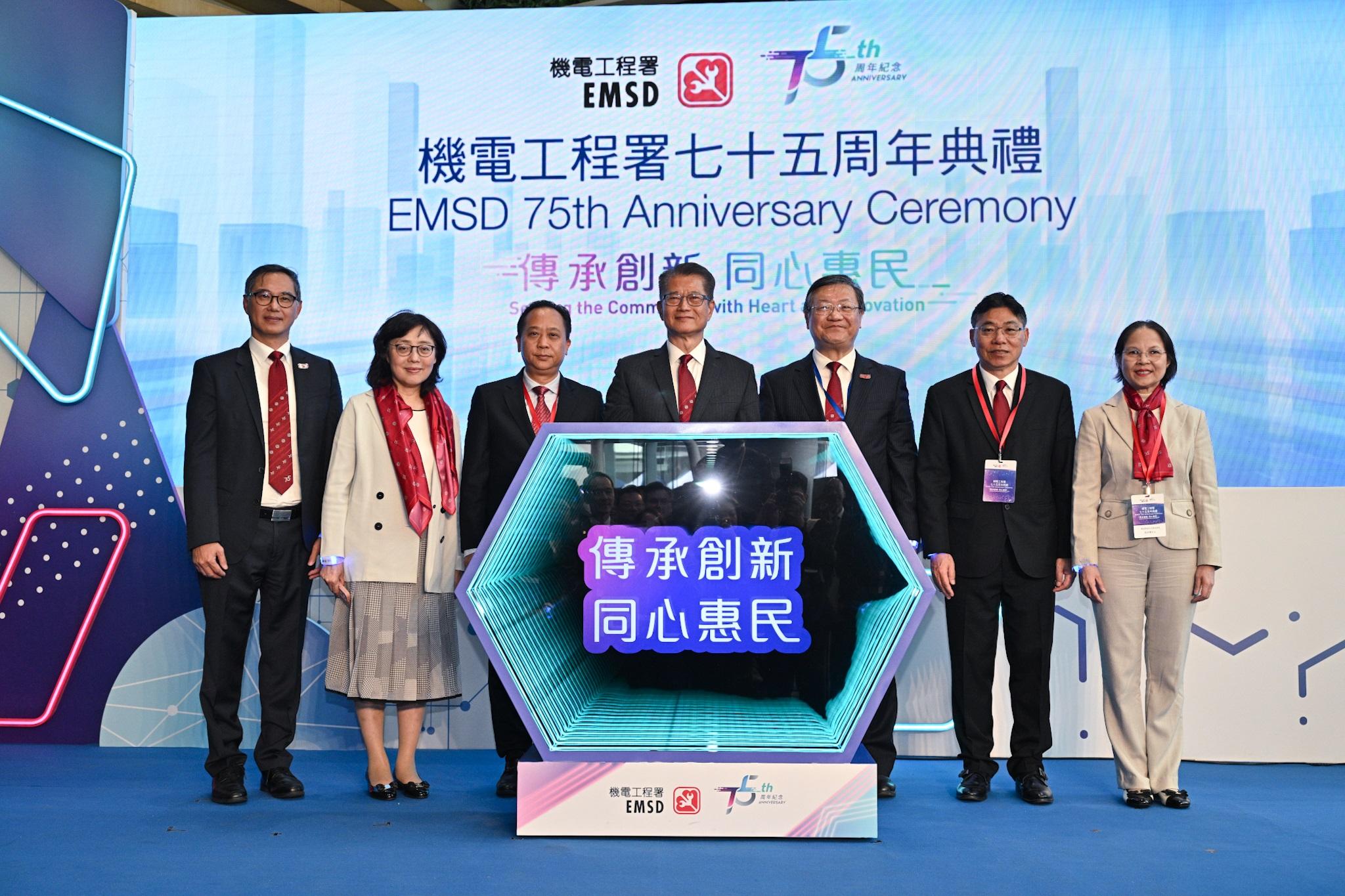 The Electrical and Mechanical Services Department (EMSD) held the 75th Anniversary Ceremony today (November 30). Photo shows (from left) the Permanent Secretary for Development (Works), Mr Ricky Lau; the Secretary for Development, Ms Bernadette Linn; the Deputy Director-General of the Department of Educational, Scientific and Technological Affairs of the Liaison Office of the Central People's Government in the Hong Kong Special Administrative Region, Mr Ye Shuiqiu; the Financial Secretary, Mr Paul Chan; the Director of Electrical and Mechanical Services, Mr Eric Pang; the Secretary for Transport and Logistics, Mr Lam Sai-hung; and the Acting Secretary for Environment and Ecology, Miss Diane Wong, at the ceremony.