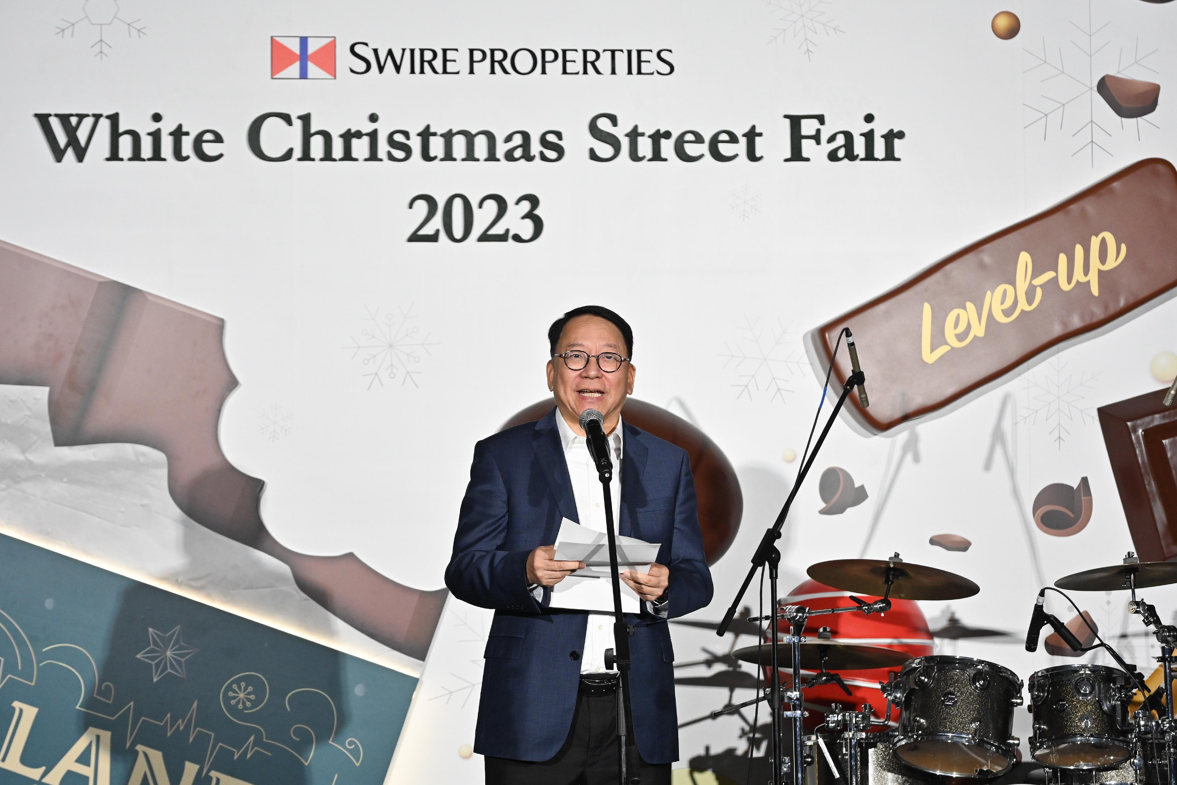 The Chief Secretary for Administration, Mr Chan Kwok-ki, speaks at the Opening Ceremony of the White Christmas Street Fair 2023 today (November 30).