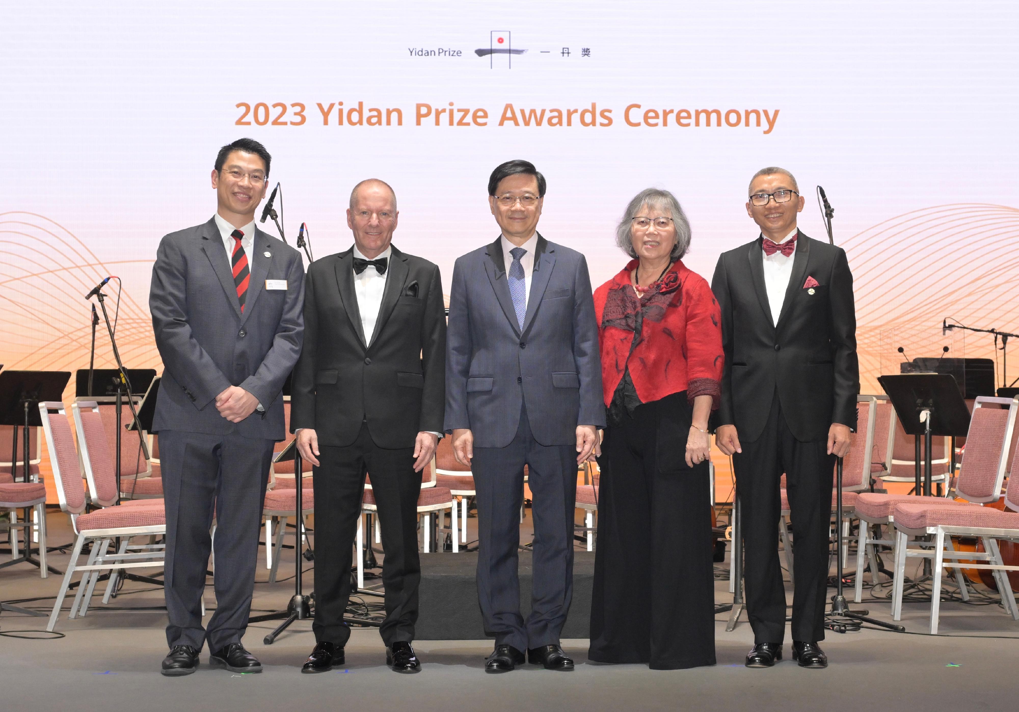 The Chief Executive, Mr John Lee, attended the 2023 Yidan Prize Awards Ceremony today (December 3). Photo shows (from left) the Secretary-General of the Yidan Prize Foundation, Mr Edward Ma; 2023 Yidan Prize for Education Development Laureate, Mr Shai Reshef; Mr Lee; 2023 Yidan Prize for Education Research Laureate, Professor Michelene Chi, and the Founder of Yidan Prize, Dr Charles Chen, at the ceremony.