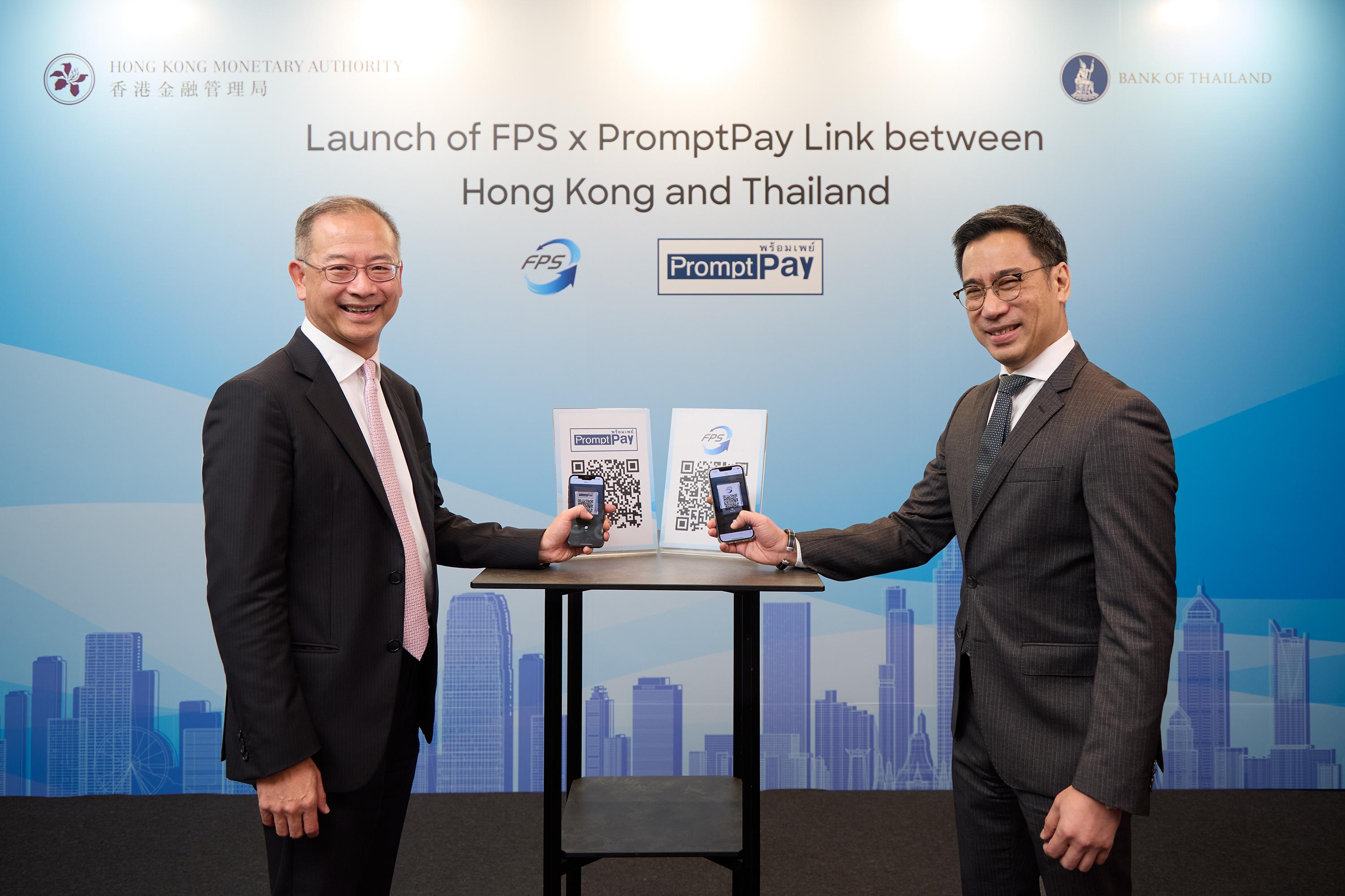 The Chief Executive of the Hong Kong Monetary Authority, Mr Eddie Yue (left), and the Governor of the Bank of Thailand, Dr Sethaput Suthiwartnarueput (right), attend the launching ceremony of the FPS x PromptPay Link.
