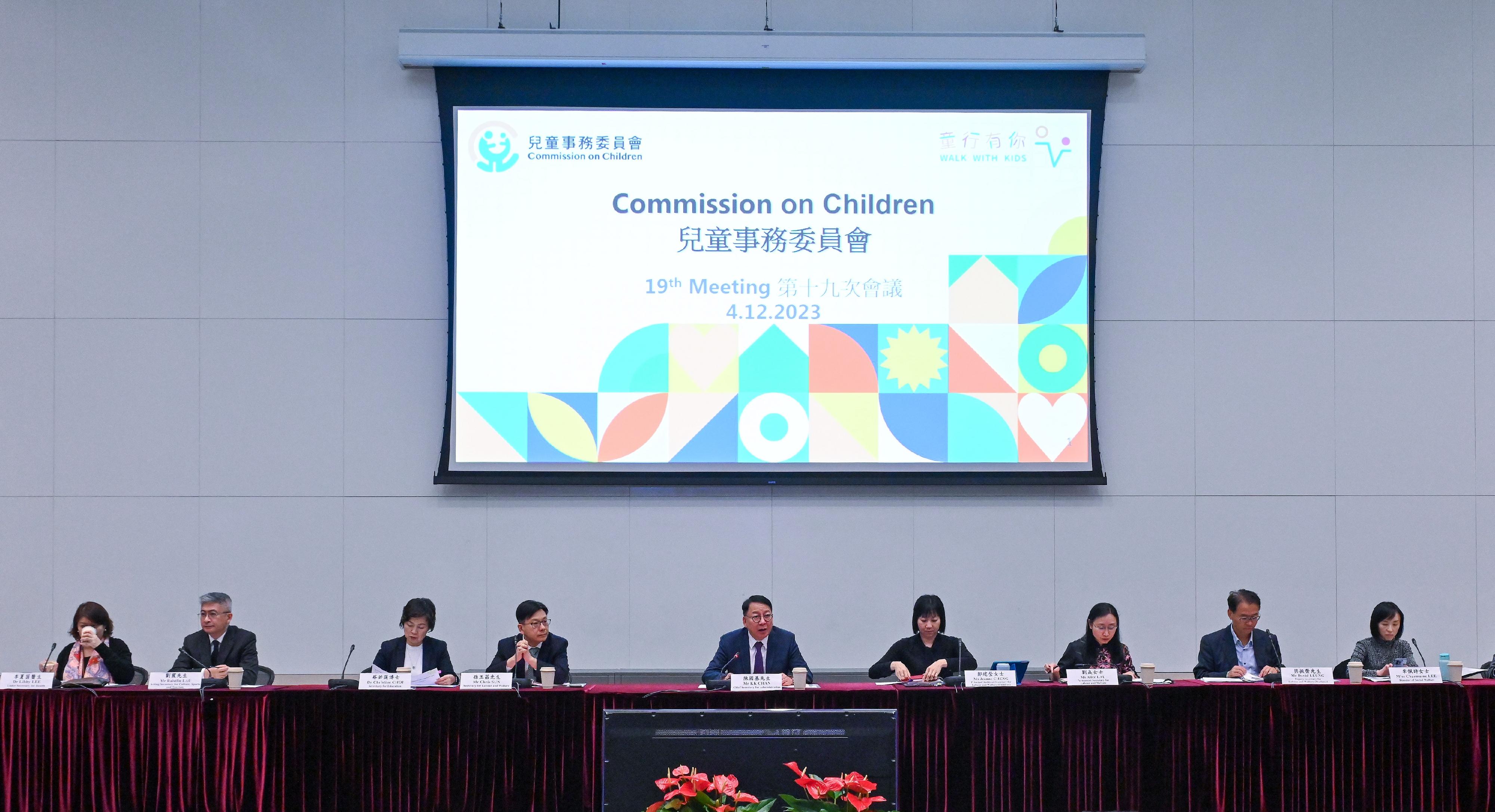 The Chief Secretary for Administration, Mr Chan Kwok-ki (centre), today (December 4) chairs the 19th meeting of the Commission on Children.