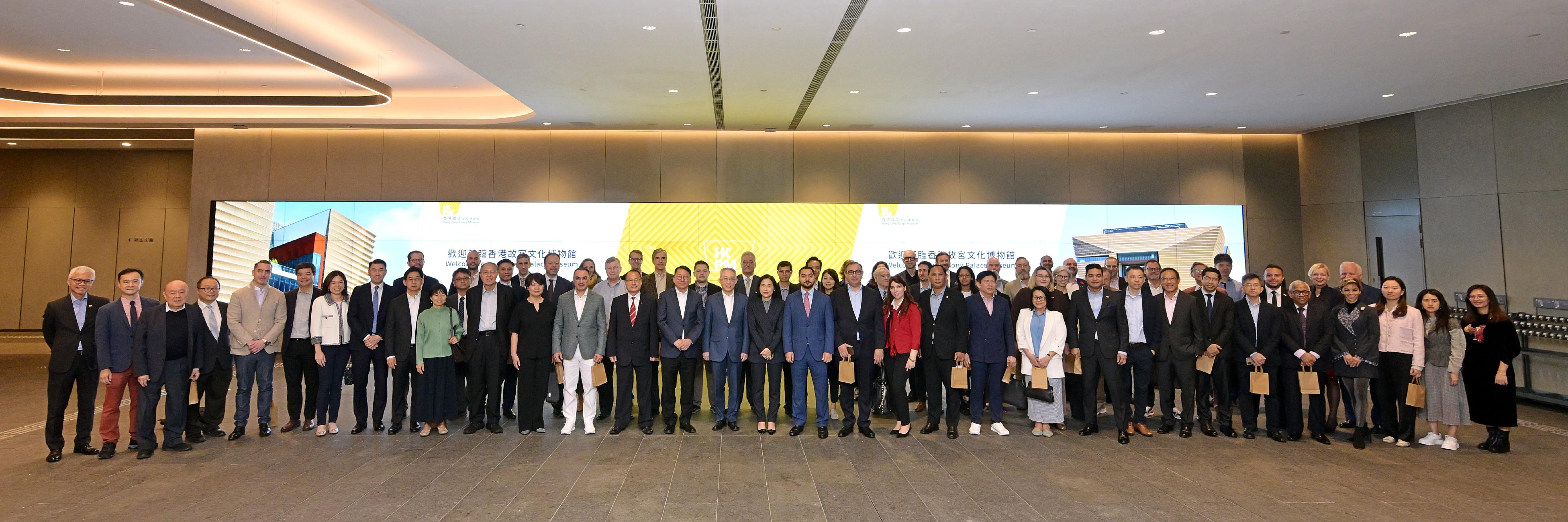 The Chief Secretary for Administration, Mr Chan Kwok-ki, attended "Thousands of Years at a Glance: Exploring Ancient Chinese Civilization - visit to Hong Kong Palace Museum" today (December 5). Photo shows Mr Chan (front row, 19th right); the Acting Commissioner of the Office of the Commissioner of the Ministry of Foreign Affairs of the People's Republic of China in the Hong Kong Special Administrative Region, Mr Li Yongsheng (front row, 18th right); the Chief Executive Officer of the West Kowloon Cultural District Authority, Mrs Betty Fung (front row, 17th right), and other guests at the event. 