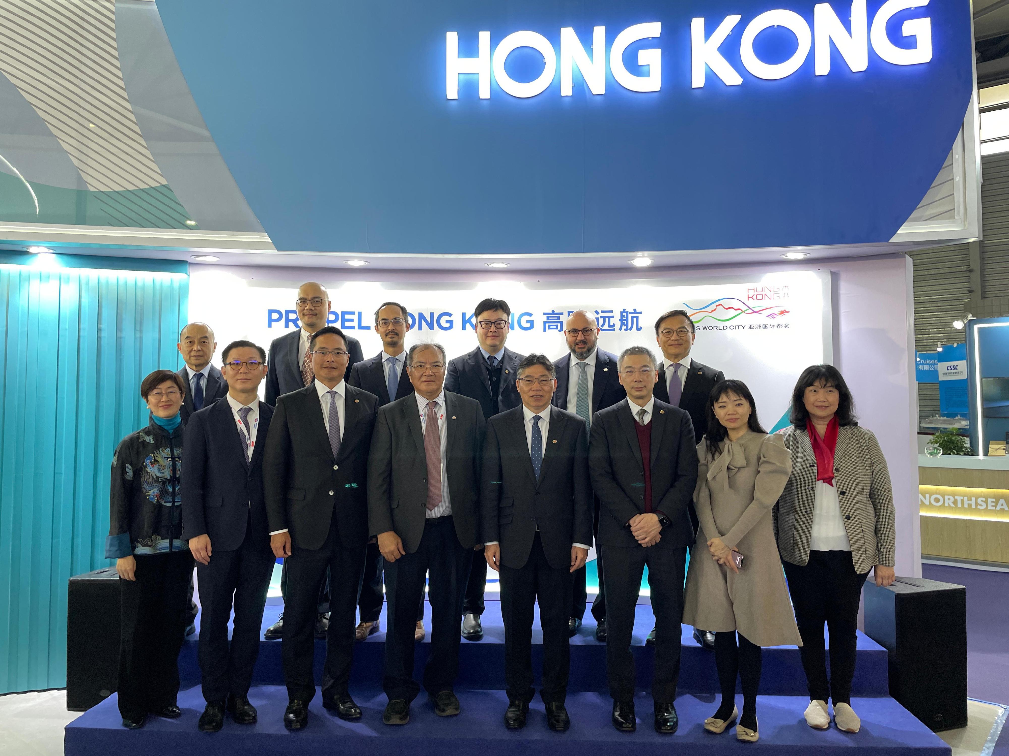 The Chairman of the Hong Kong Maritime and Port Board (HKMPB) and the Secretary for Transport and Logistics, Mr Lam Sai-hung (front row, fourth right) leads members of the HKMPB to visit the Marintec China 2023 in Shanghai and takes a group photo with the members at the opening ceremony of the China Hong Kong Pavilion today (December 5).
