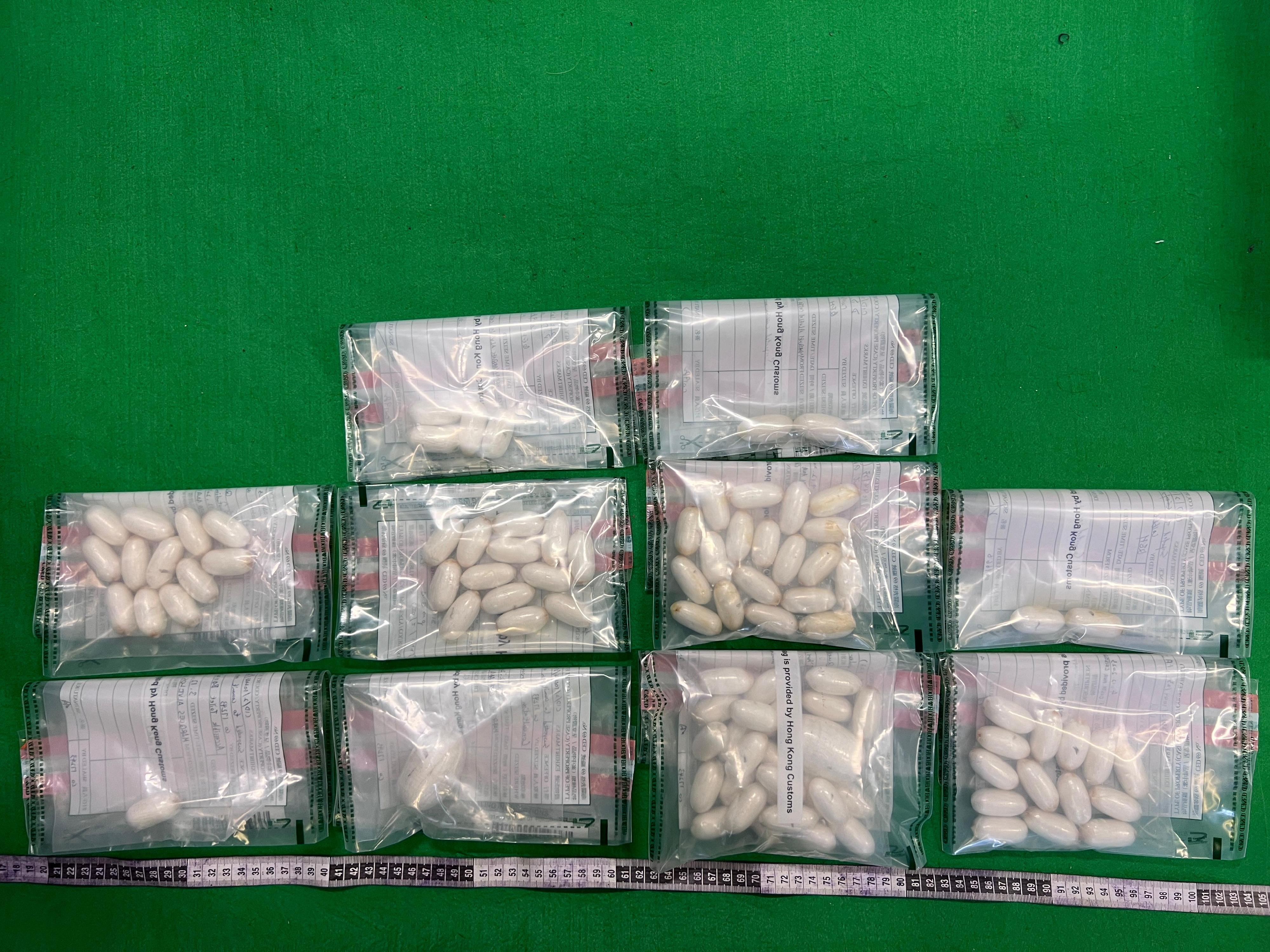 Hong Kong Customs on December 3 detected a dangerous drugs internal concealment case involving two incoming passengers at Hong Kong International Airport and seized about 1.8 kilograms of suspected cocaine with an estimated market value of about $2 million. Photo shows the suspected cocaine seized.
 
