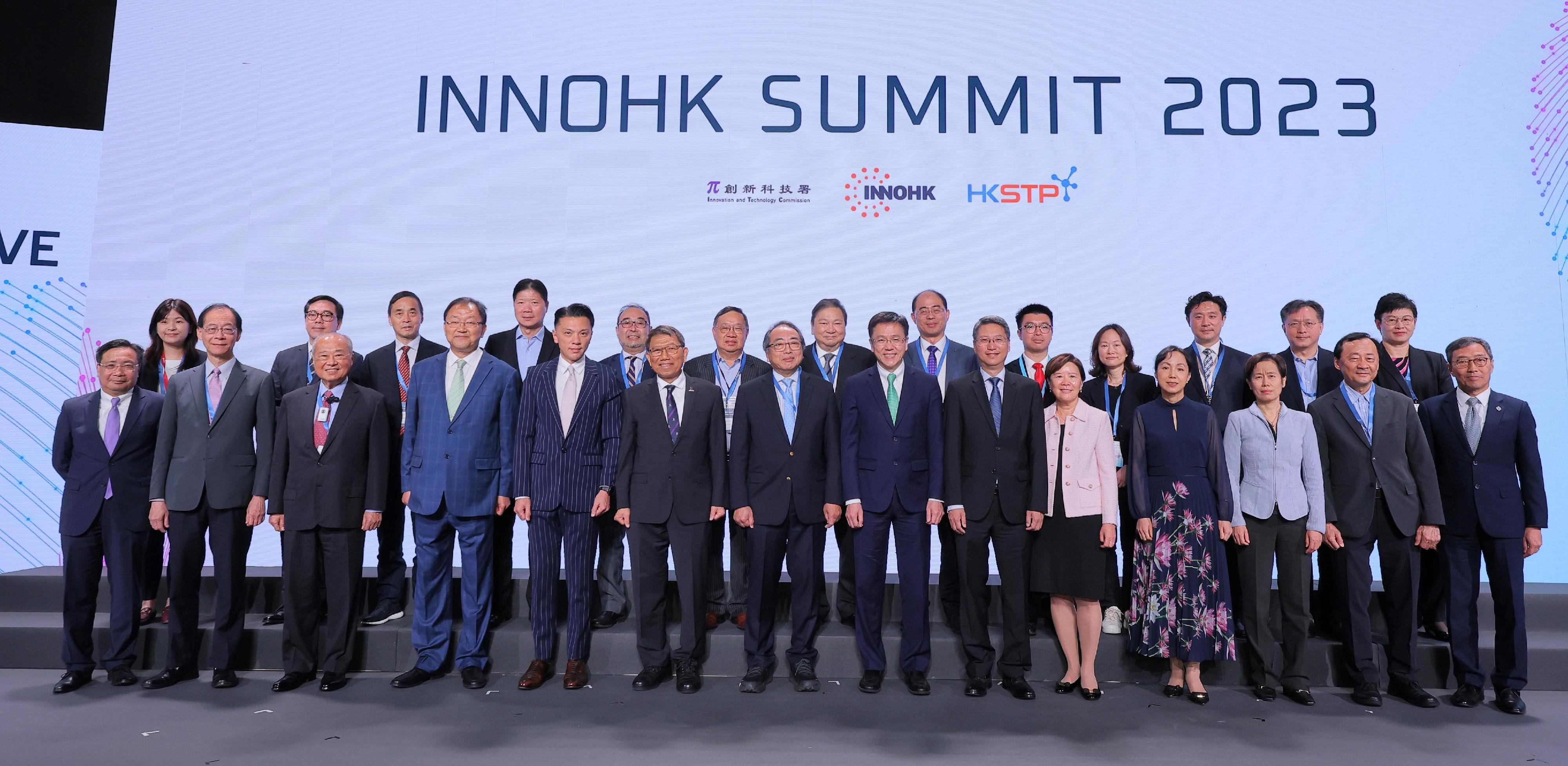 Organised by the Innovation and Technology Commission and the Hong Kong Science and Technology Parks Corporation (HKSTPC), the InnoHK Summit 2023 was held at Hong Kong Science Park today (December 6). Photo shows the Secretary for Innovation, Technology and Industry, Professor Sun Dong (front row, seventh right); the Founding President of the Hong Kong Academy of Sciences and Chairman of the InnoHK Steering Committee, Professor Tsui Lap-chee (front row, seventh left); the Permanent Secretary for Innovation, Technology and Industry, Mr Eddie Mak (front row, sixth right); Deputy Director-General of the Department of Educational, Scientific and Technological Affairs of the Liaison Office of the Central People's Government in the Hong Kong Special Administrative Region Ms Wu Cheng (front row, fourth right); the Commissioner for Innovation and Technology, Mr Ivan Lee (front row, first left); and the Chief Executive Officer of the HKSTPC, Mr Albert Wong (front row, first right), with members from the InnoHK Steering Committee, members of the Board of the HKSTPC, presidents, chairmen and representatives of universities and institutions participating in InnoHK, and other guests.
