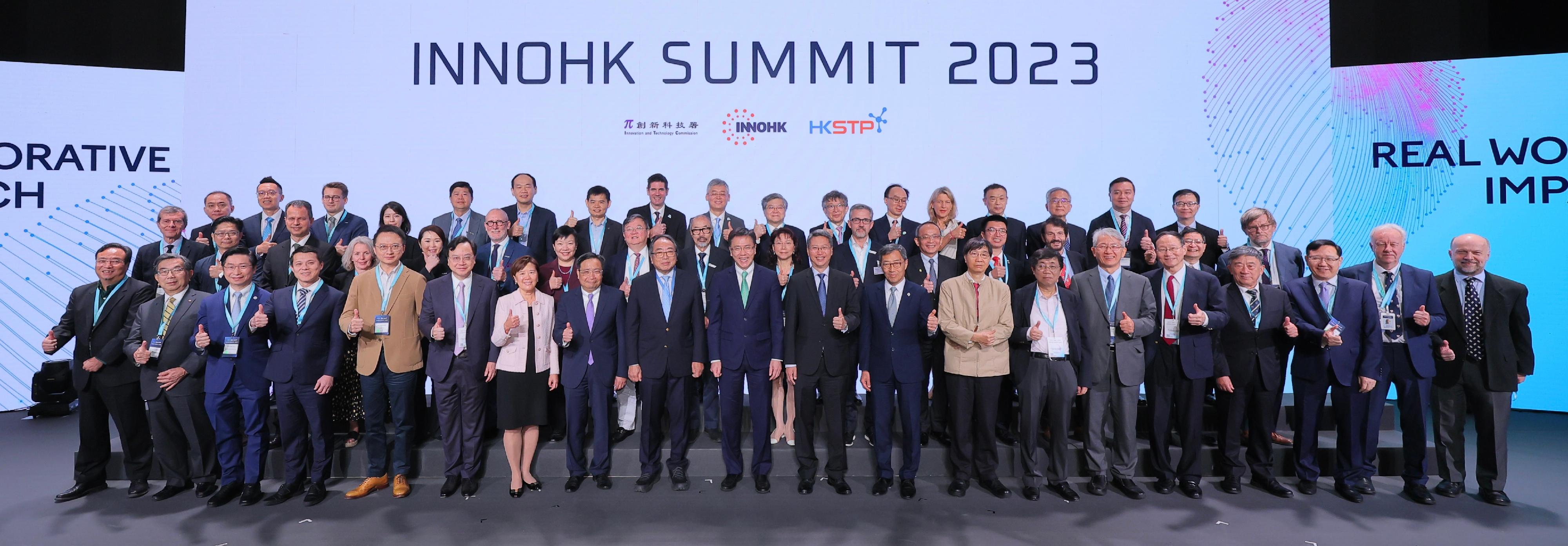 Organised by the Innovation and Technology Commission and the Hong Kong Science and Technology Parks Corporation (HKSTPC), the InnoHK Summit 2023 was held at Hong Kong Science Park today (December 6). Photo shows the Secretary for Innovation, Technology and Industry, Professor Sun Dong (front row, 10th left); the Founding President of the Hong Kong Academy of Sciences and Chairman of the InnoHK Steering Committee, Professor Tsui Lap-chee (front row, ninth left); the Permanent Secretary for Innovation, Technology and Industry, Mr Eddie Mak (front row, 10th right); the Commissioner for Innovation and Technology, Mr Ivan Lee (front row, eighth left); and the Chief Executive Officer of the HKSTPC, Mr Albert Wong (front row, ninth right), with directors of InnoHK research centres and their non-local collaborators.
