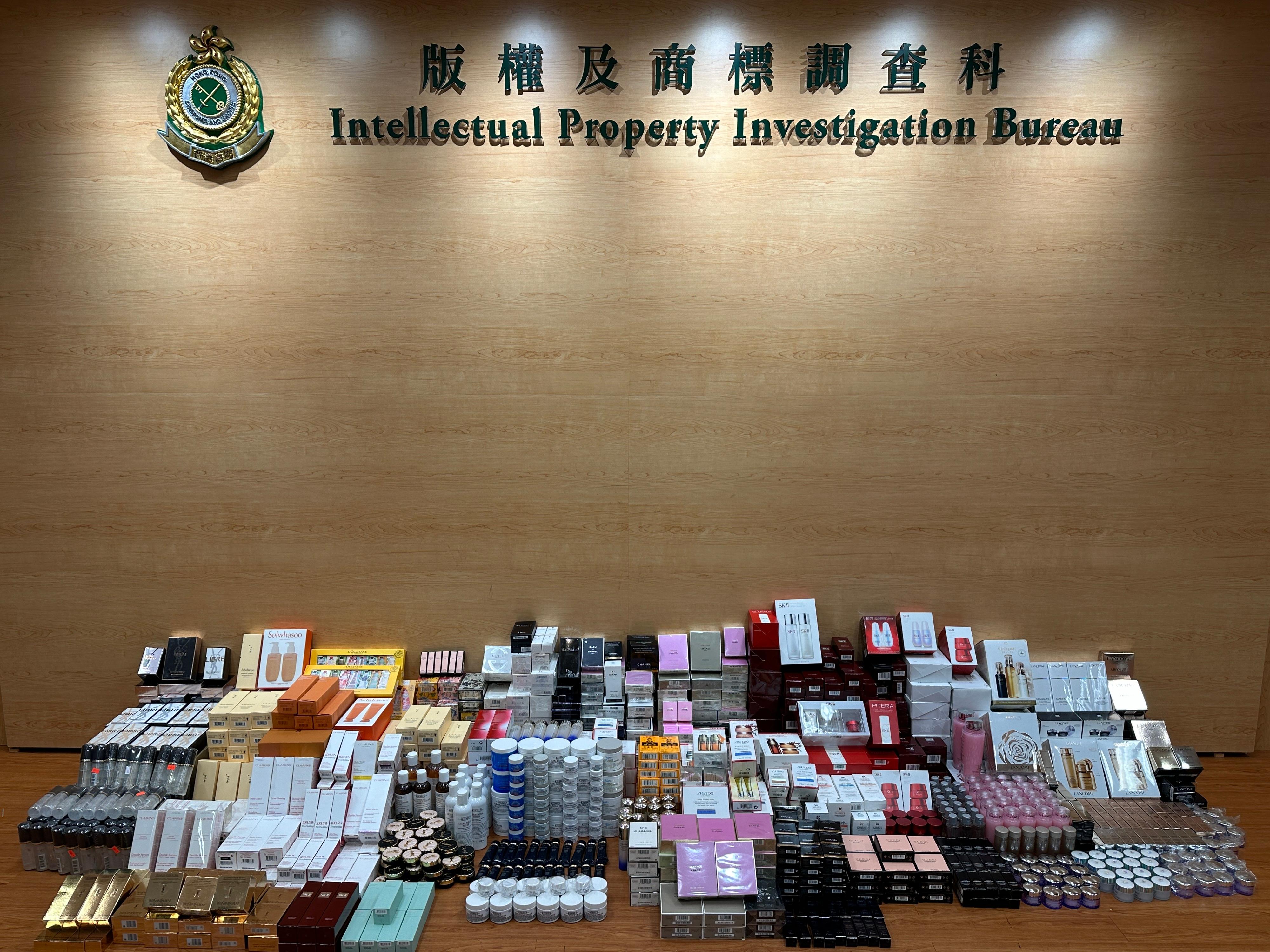 Hong Kong Customs yesterday (December 6) conducted a special operation in Sheung Shui to combat the sale of counterfeit goods and seized about 2 300 items of suspected counterfeit goods, including cosmetics, skincare products and perfumes, with an estimated market value of about $500,000. Photo shows the suspected counterfeit goods seized.
