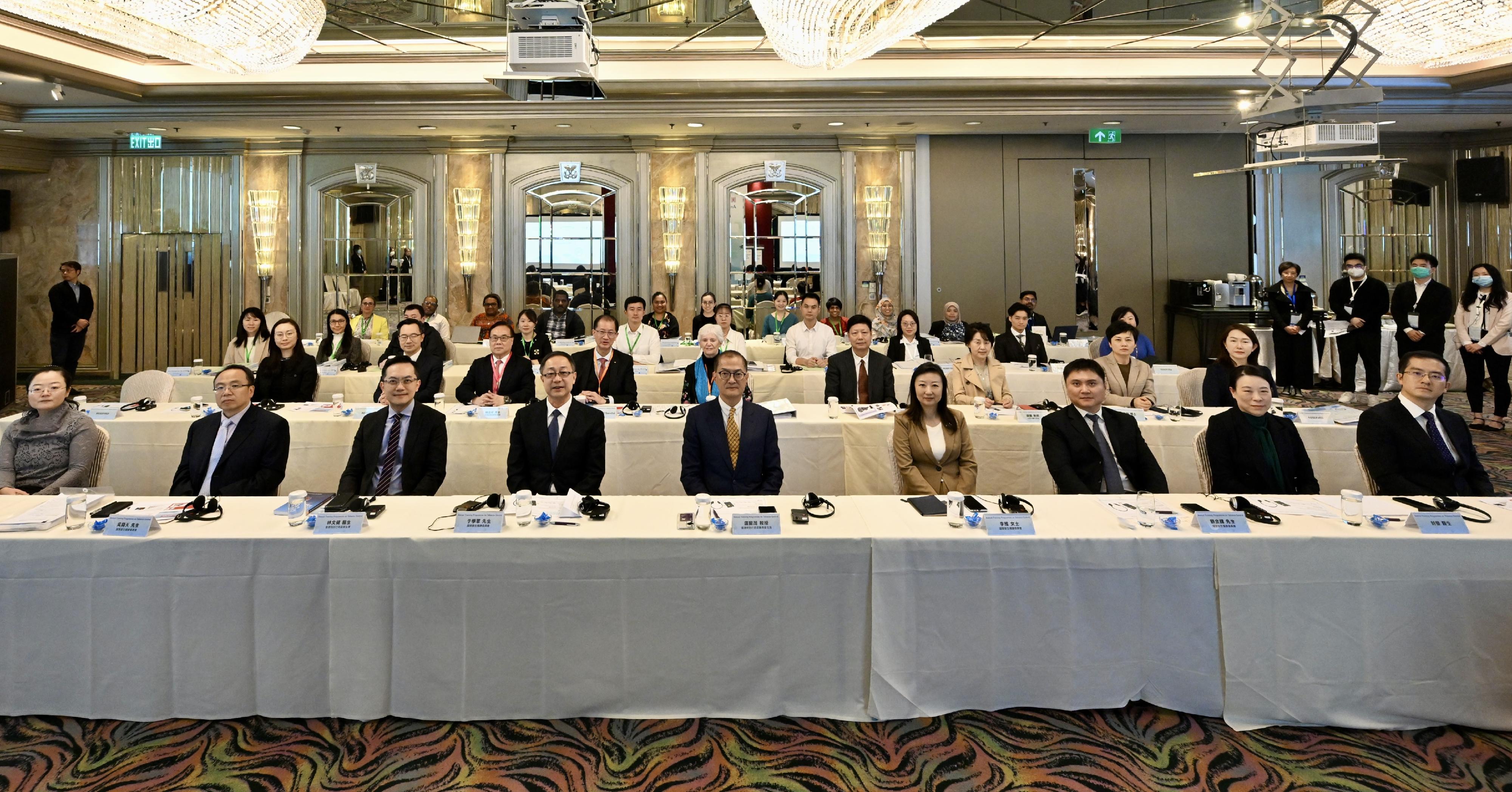 The Tobacco and Alcohol Control Office of the Department of Health organised the five-day Annual Training Programme on Tobacco Control 2023, and the closing ceremony was held today (December 7). Photo shows Vice-minister of the National Health Commission Mr Yu Xuejun (front row, fourth left), the Secretary for Health, Professor Lo Chung-mau (front row, centre), and the Director of Health, Dr Ronald Lam (front row, third left), with the participants during the closing ceremony.
