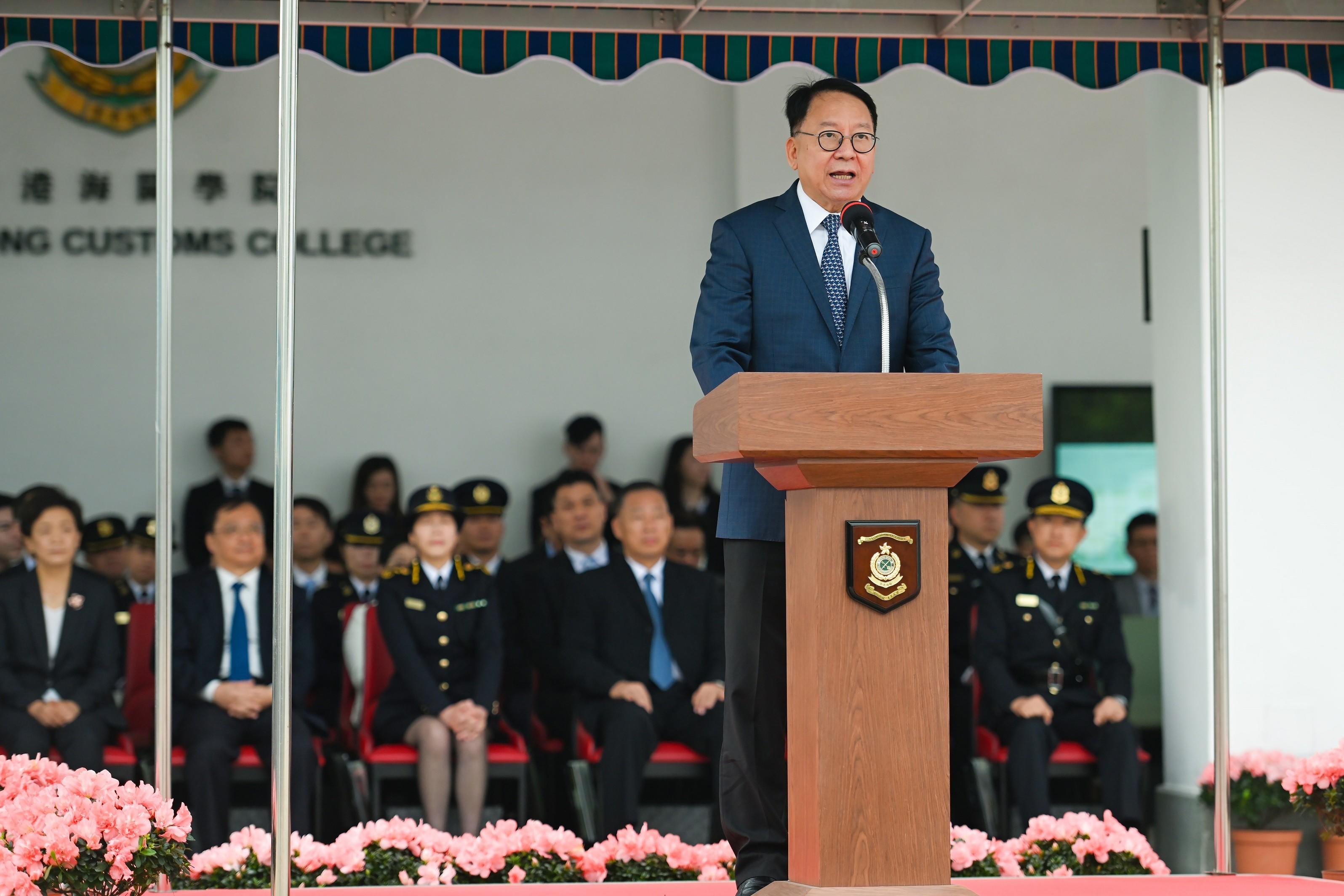 The Chief Secretary for Administration, Mr Chan Kwok-ki, delivers a speech at the Hong Kong Customs Passing-out Parade today (December 8).