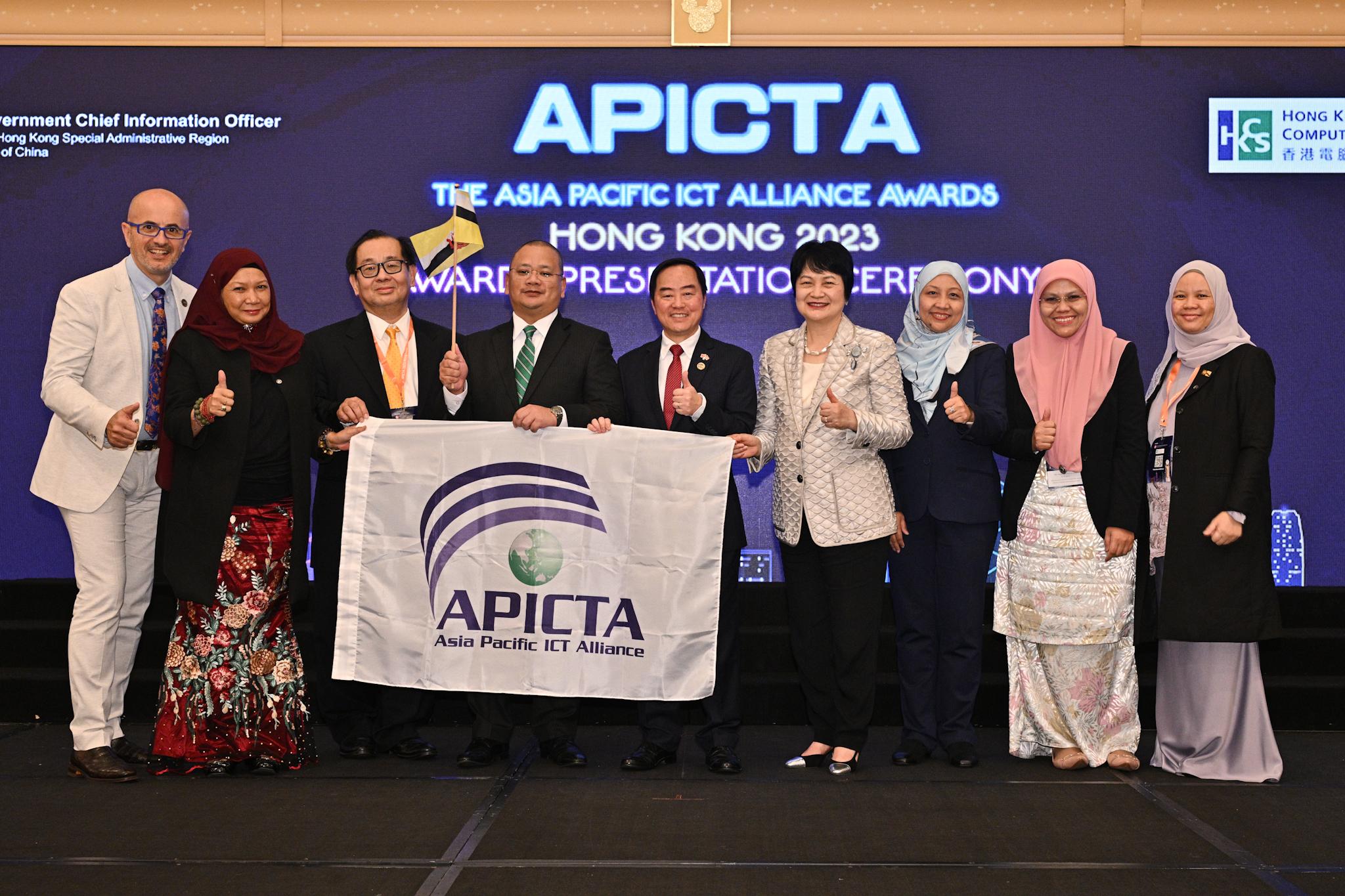 The Government Chief Information Officer, Mr Tony Wong (centre), joins other guests and representatives from Brunei Darussalam at the Awards Presentation Ceremony of the Asia Pacific Information and Communications Technology Alliance Awards 2023 today (December 8). Brunei Darussalam has been chosen as the host of the 23rd APICTA Awards next year.
