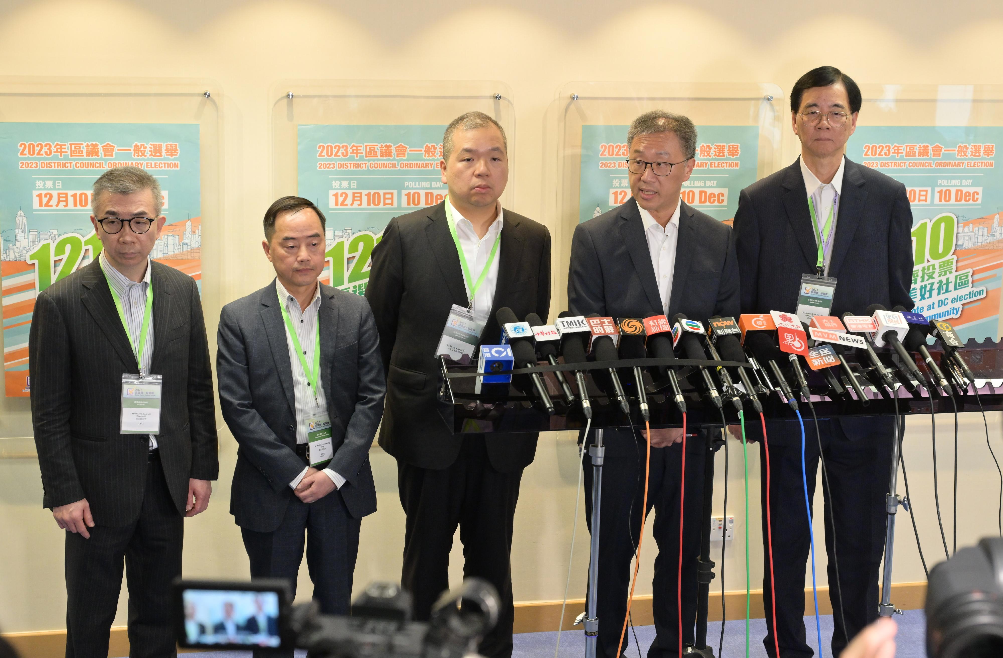The Chairman of the Electoral Affairs Commission (EAC), Mr Justice David Lok (fourth left); EAC members Professor Daniel Shek (fifth left) and Mr Bernard Man, SC (third left), meet the media to conclude the 2023 District Council Ordinary Election this morning (December 11). Also present are the Government Chief Information Officer, Mr Tony Wong (second left), and the Chief Electoral Officer of the Registration and Electoral Office, Mr Raymond Wang (first left).