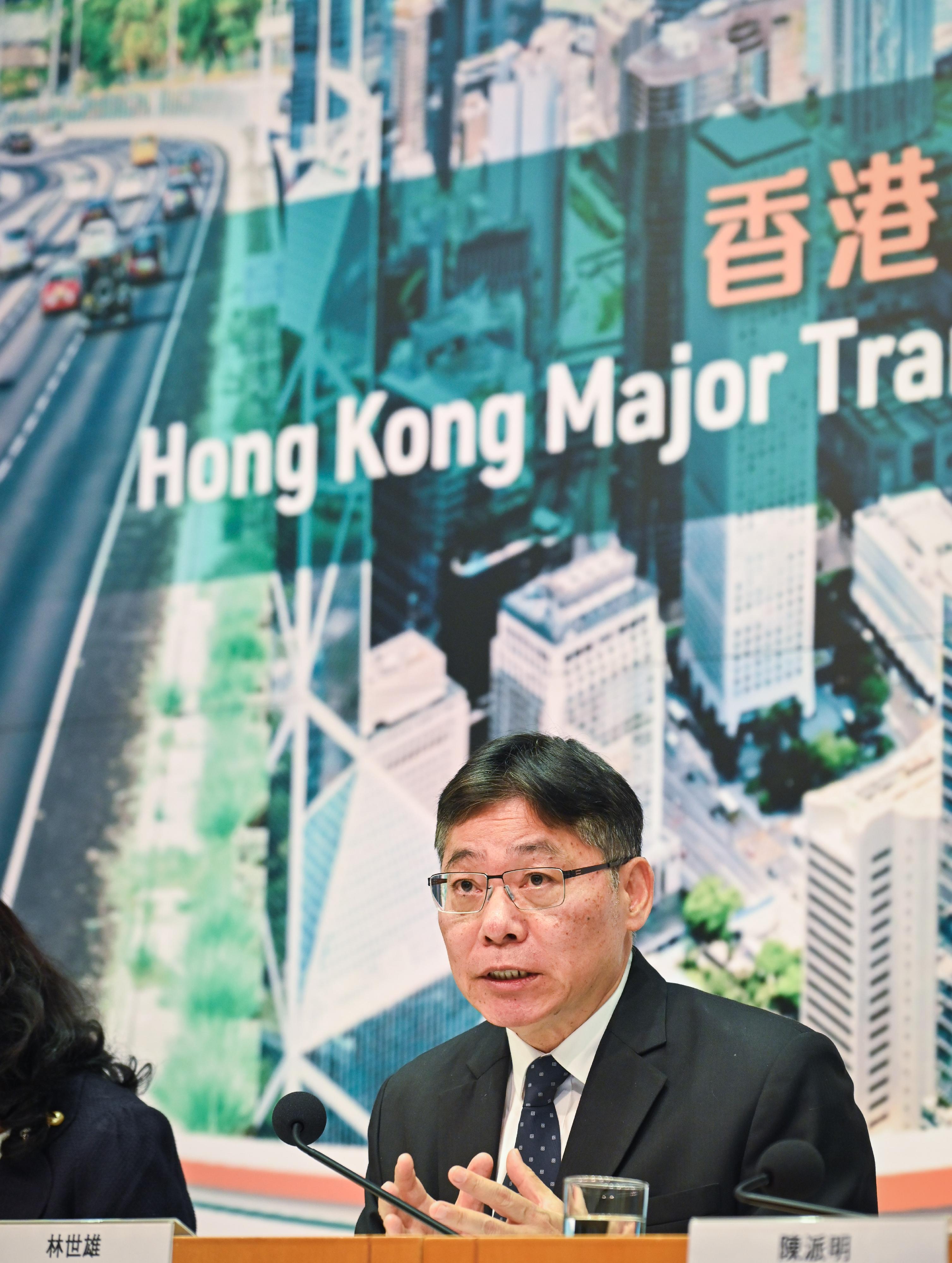 The Secretary for Transport and Logistics, Mr Lam Sai-hung, illustrates the vision and objectives of the Blueprint at the press conference on the Hong Kong Major Transport Infrastructure Development Blueprint today (December 12).