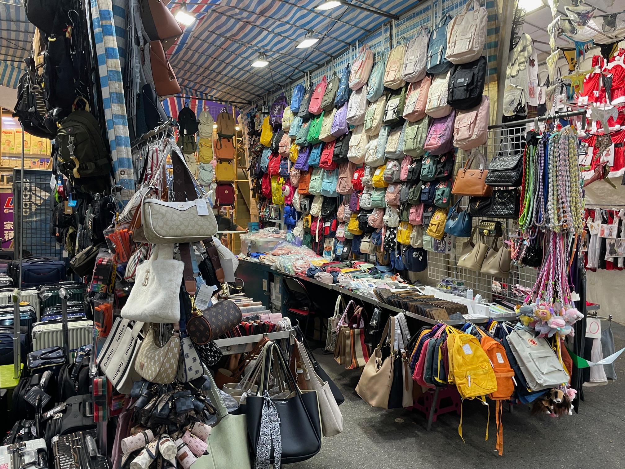 Hong Kong Customs today (December 12) conducted a special operation in Mong Kok to combat the sale of counterfeit goods and seized about 7 000 items of suspected counterfeit goods with an estimated market value of about $900,000. Photo shows one of the fixed-pitch hawker stalls raided by Customs officers.
