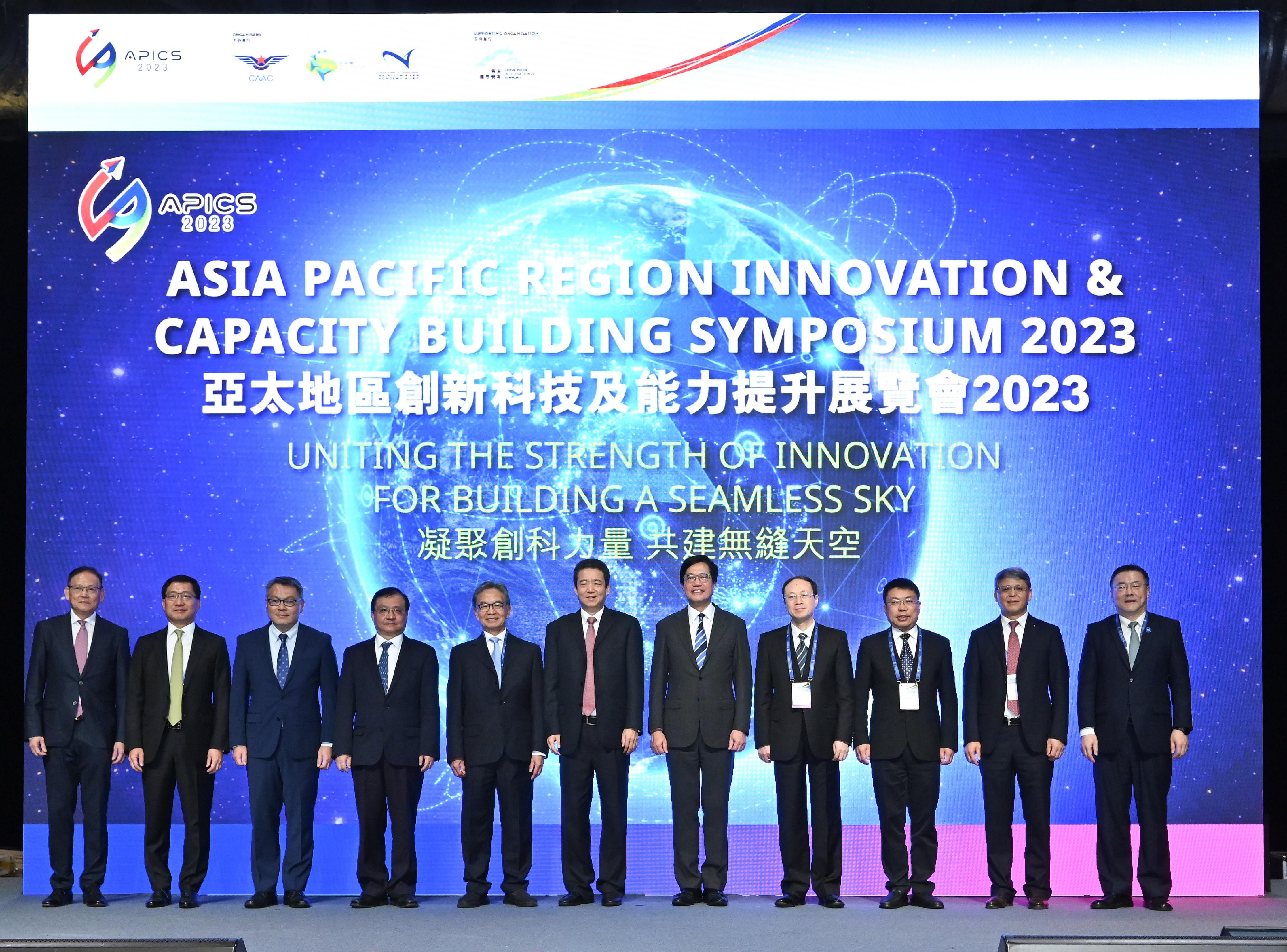 The Asia Pacific Region Innovation & Capacity Building Symposium 2023 (APICS 2023) commenced today (December 14). Photo shows the Deputy Financial Secretary, Mr Michael Wong (fifth right); Deputy Administrator of Civil Aviation Administration of China (CAAC) Mr Cui Xiaofeng (sixth left); the Director of the Bureau III of the Hong Kong and Macao Affairs Office of the State Council, Mr Wu Wei (fourth right); Deputy Commissioner of the Office of the Commissioner of the Ministry of Foreign Affairs of the People's Republic of China in the Hong Kong Special Administrative Region (HKSAR) Mr Fang Jianming (fourth left); Deputy Director-General Development of Economic Affairs of the Liaison Office of the Central People's Government in the HKSAR Mr Lyu Feng (third right); the Chief Engineer of the CAAC, Mr Yin Shijun (second right); the Chairman of the Airport Authority Hong Kong (AAHK), Mr Jack So (fifth left); the Director-General of the Hong Kong Civil Aviation Department, Mr Victor Liu (third left); the Chief Executive Officer of the AAHK, Mr Fred Lam (second left); the President of the Hong Kong International Aviation Academy, Mr Simon Li (first left); the International Civil Aviation Organization Asia Pacific Regional Director, Mr Ma Tao (first right), officiating at the APICS 2023 opening ceremony.

