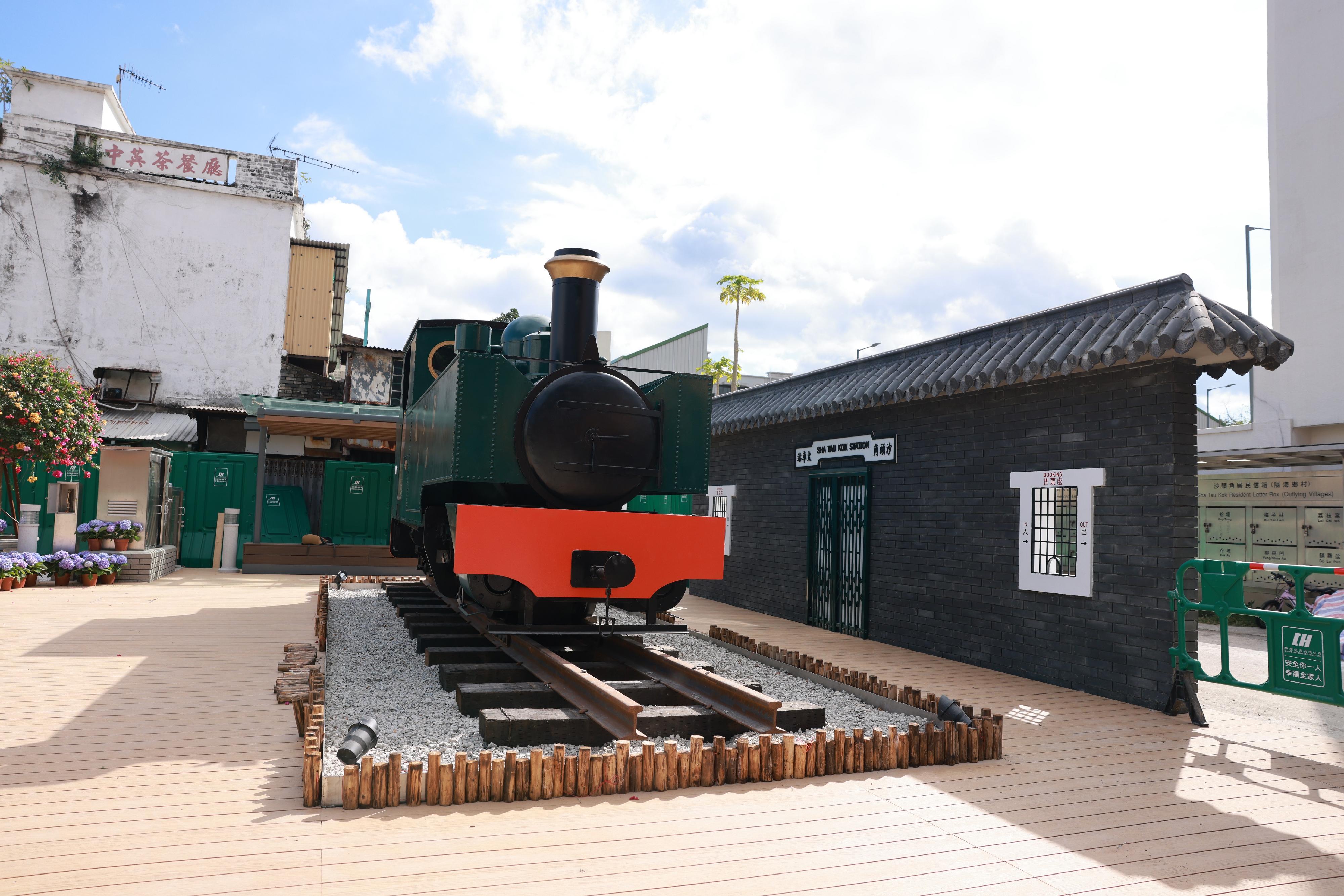 The Second Phase Opening-up of Sha Tau Kok will begin on January 1 next year. Initially, up to 1,000 tourists per day will be allowed to visit all parts of Sha Tau Kok, except Chung Ying Street, after applying online for a Closed Area Permit. Photo shows a replica of an old railway station in Hong Kong and a model actual-size locomotive at the Chung Ying Street Garden.
