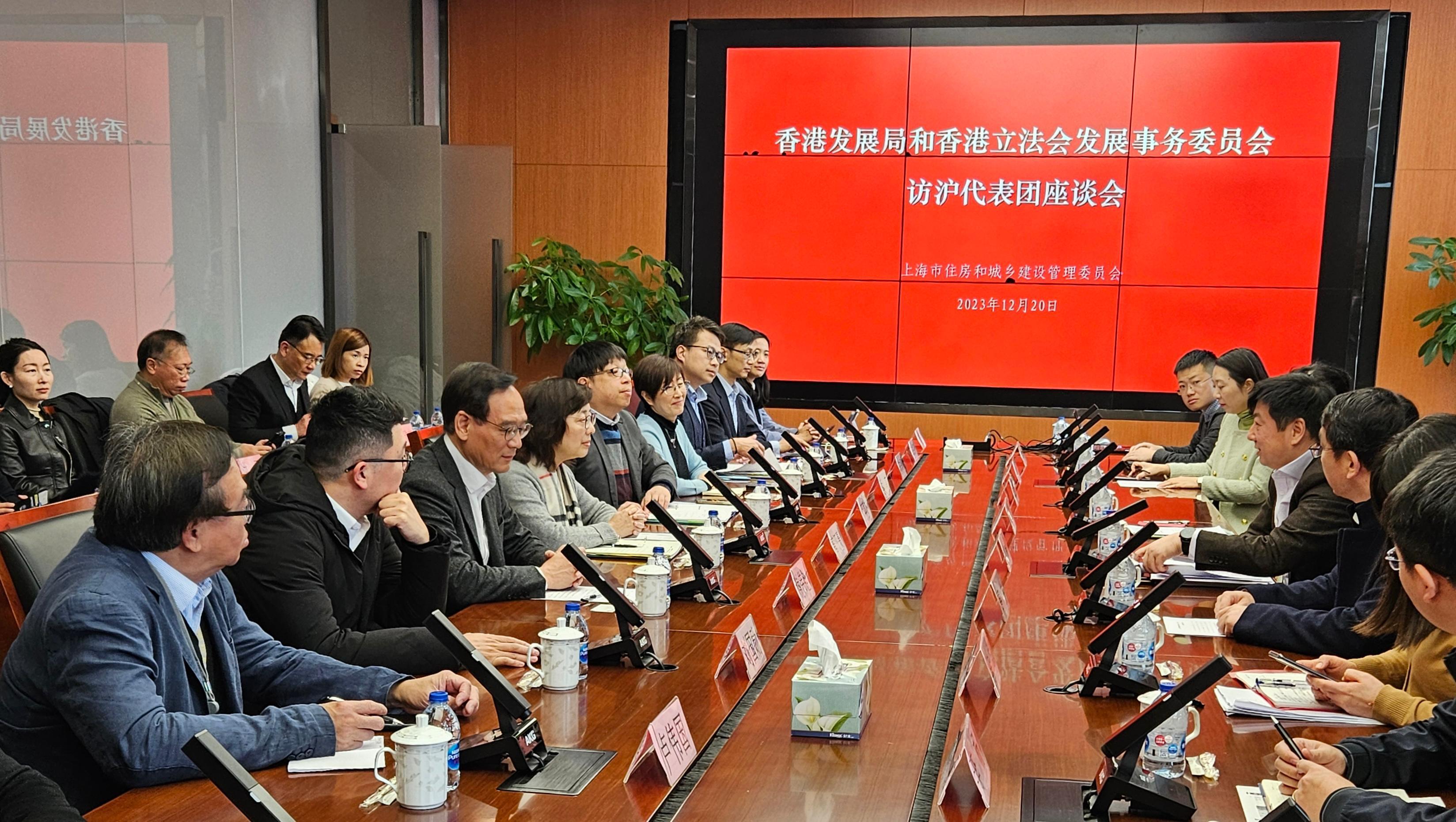 The Secretary for Development, Ms Bernadette Linn, leading a delegation of the Development Bureau, today (December 20) continued her visit to Shanghai, together with a delegation of the Legislative Council Panel on Development. Photos shows Ms Linn (fourth left) and the delegations exchanging views with Deputy Director-General of the Shanghai Municipal Commission of Housing, Urban-Rural Development and Management Mr Jin Chen (fourth right) and other officials.