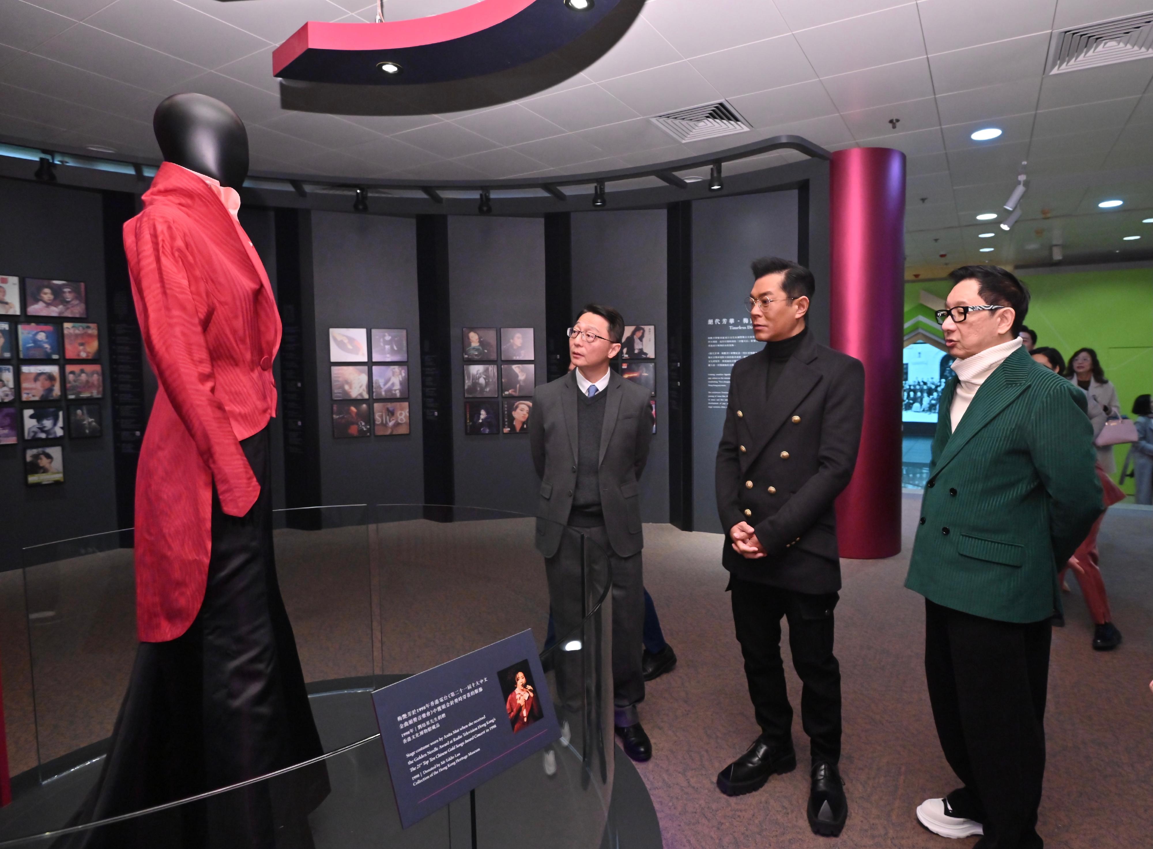 The opening ceremony for the "Timeless Diva: Anita Mui" exhibition was held today (December 23) at the Hong Kong Heritage Museum. Photo shows the officiating guests (from left) the Director of Leisure and Cultural Services, Mr Vincent Liu; the President of the Hong Kong Performing Artistes Guild, Mr Louis Koo; and a close friend of Anita Mui and fashion and image designer, Mr Eddie Lau, touring the exhibition.