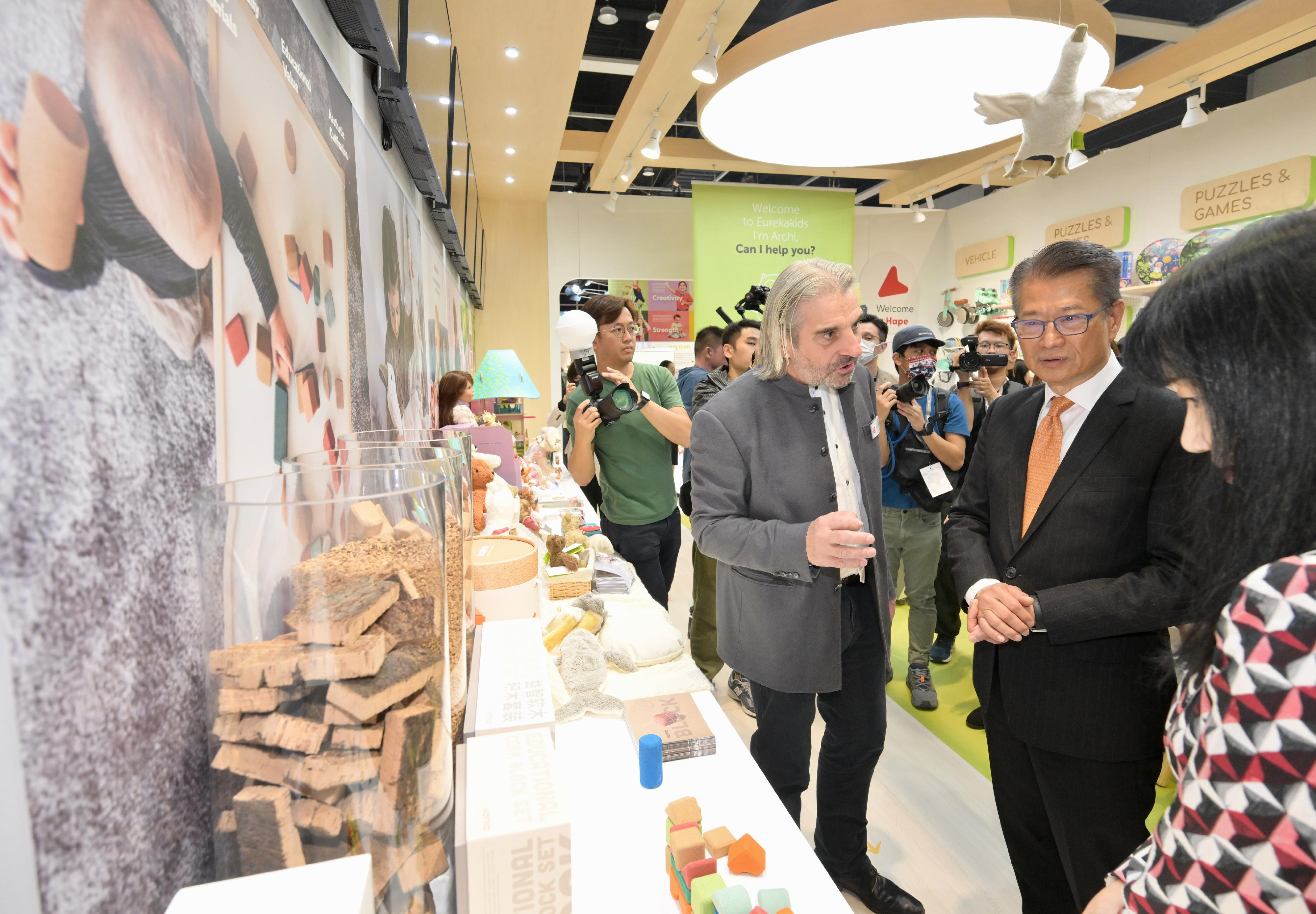 The Financial Secretary, Mr Paul Chan, attended the Joint Opening Ceremony of the HKTDC Hong Kong Toys & Games Fair and HKTDC Hong Kong Baby Products Fair 2024 organised by the Hong Kong Trade Development Council (HKTDC) this morning (January 8). Photo shows Mr Chan (second right) touring the exhibition and interacting with exhibitors.
