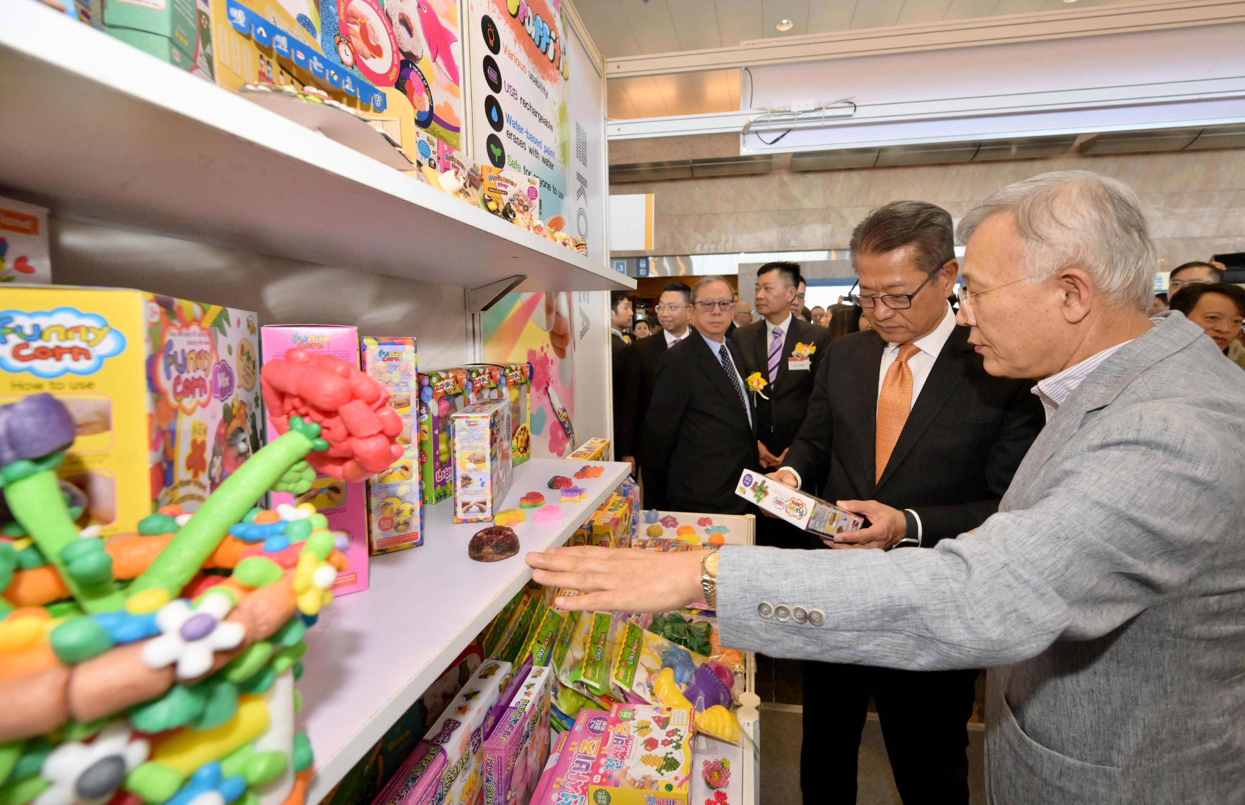 The Financial Secretary, Mr Paul Chan, attended the Joint Opening Ceremony of the HKTDC Hong Kong Toys & Games Fair and HKTDC Hong Kong Baby Products Fair 2024 organised by the Hong Kong Trade Development Council (HKTDC) this morning (January 8). Photo shows Mr Chan (second right) touring the exhibition and interacting with exhibitors.