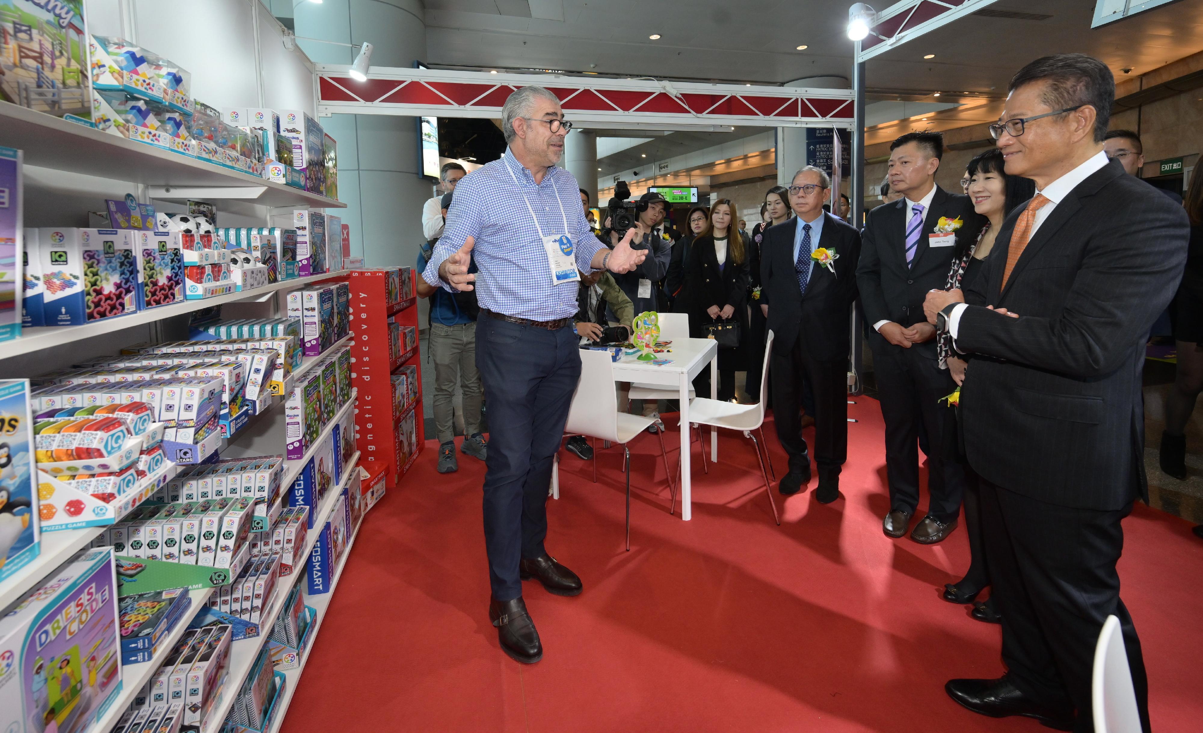 The Financial Secretary, Mr Paul Chan, attended the Joint Opening Ceremony of the HKTDC Hong Kong Toys & Games Fair and HKTDC Hong Kong Baby Products Fair 2024 organised by the Hong Kong Trade Development Council (HKTDC) this morning (January 8). Photo shows Mr Chan (first right) touring the exhibition and interacting with exhibitors.