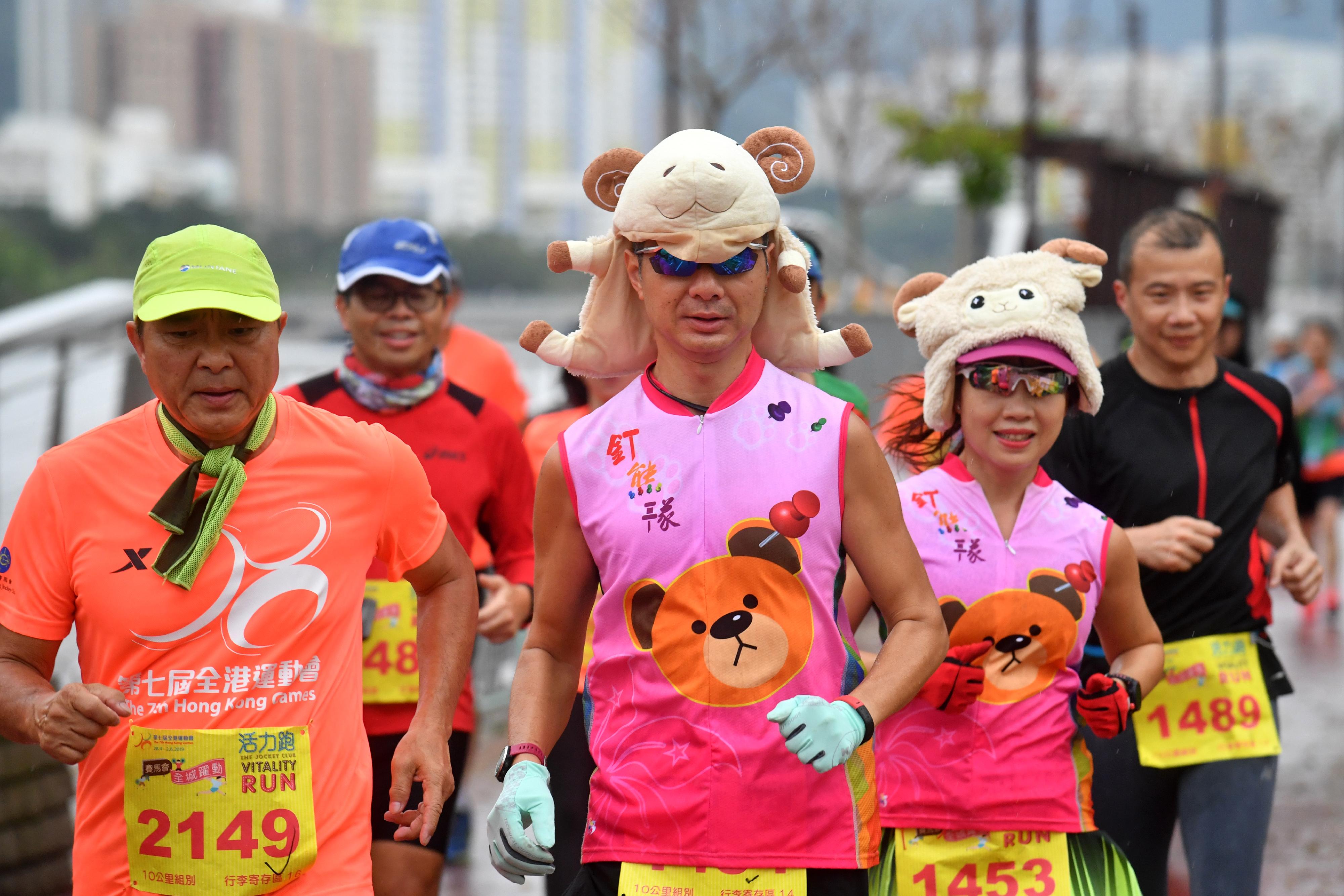 The 7th Hong Kong Games' Jockey Club Vitality Run was held alongside the Shing Mun River in Sha Tin in 2019, attracting over 5 000 members of the public to join. Photo shows some runners participating in the 7th Hong Kong Games' Jockey Club Vitality Run dressing up to compete for the individual Most Creative Costume Prize and the Overall Best Team Costume Prize.