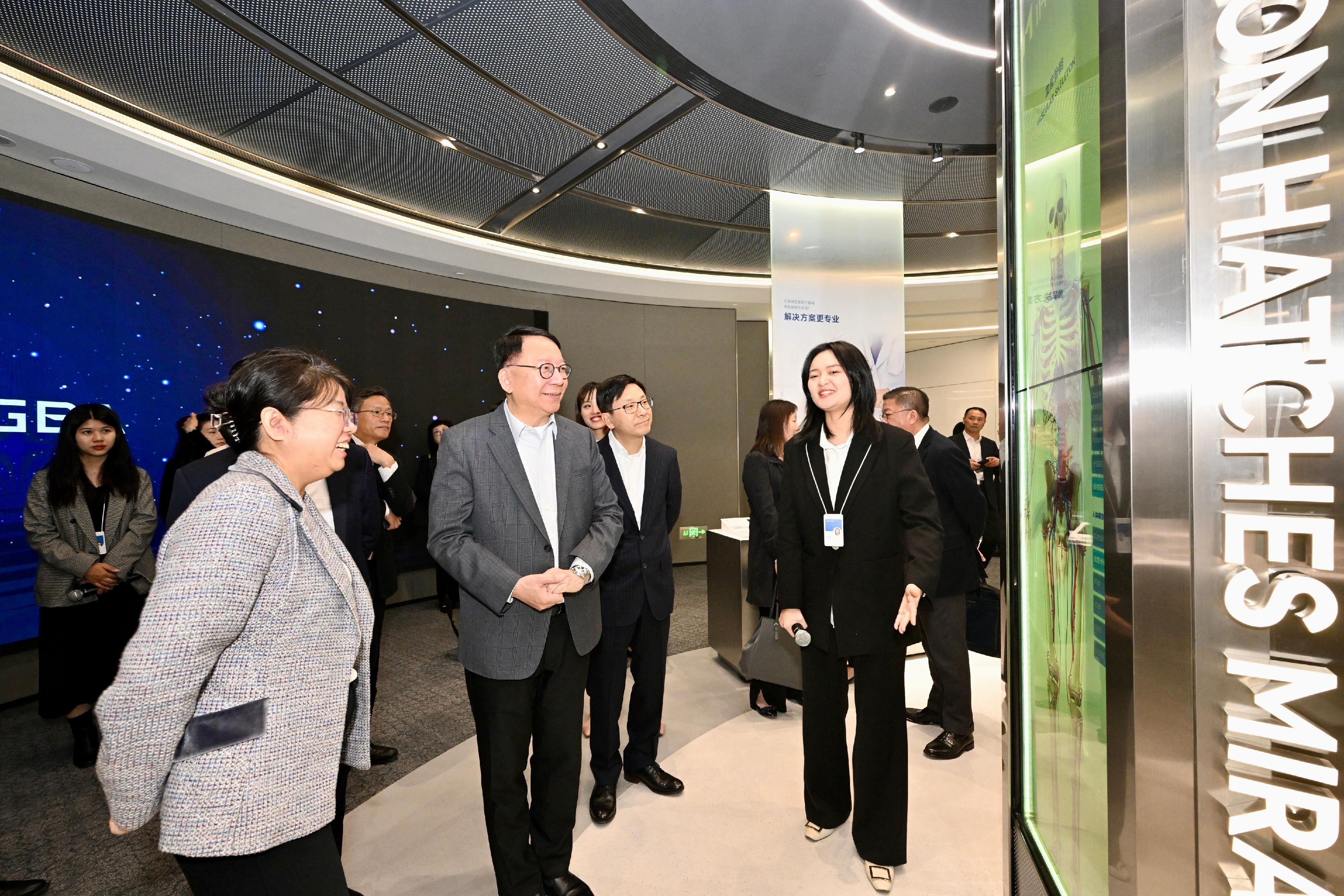The Chief Secretary for Administration, Mr Chan Kwok-ki, arrived in Guangzhou today (January 8) to begin his visit to Mainland cities of the Guangdong-Hong Kong-Macao Greater Bay Area (GBA). Photo shows Mr Chan (second left) visiting the Innovation Center of High-performance Medical Device Industry in the GBA to learn about its good progress to strengthen independent research and development capability and industrialisation of high-tech, high-precision and cutting-edge medical devices.