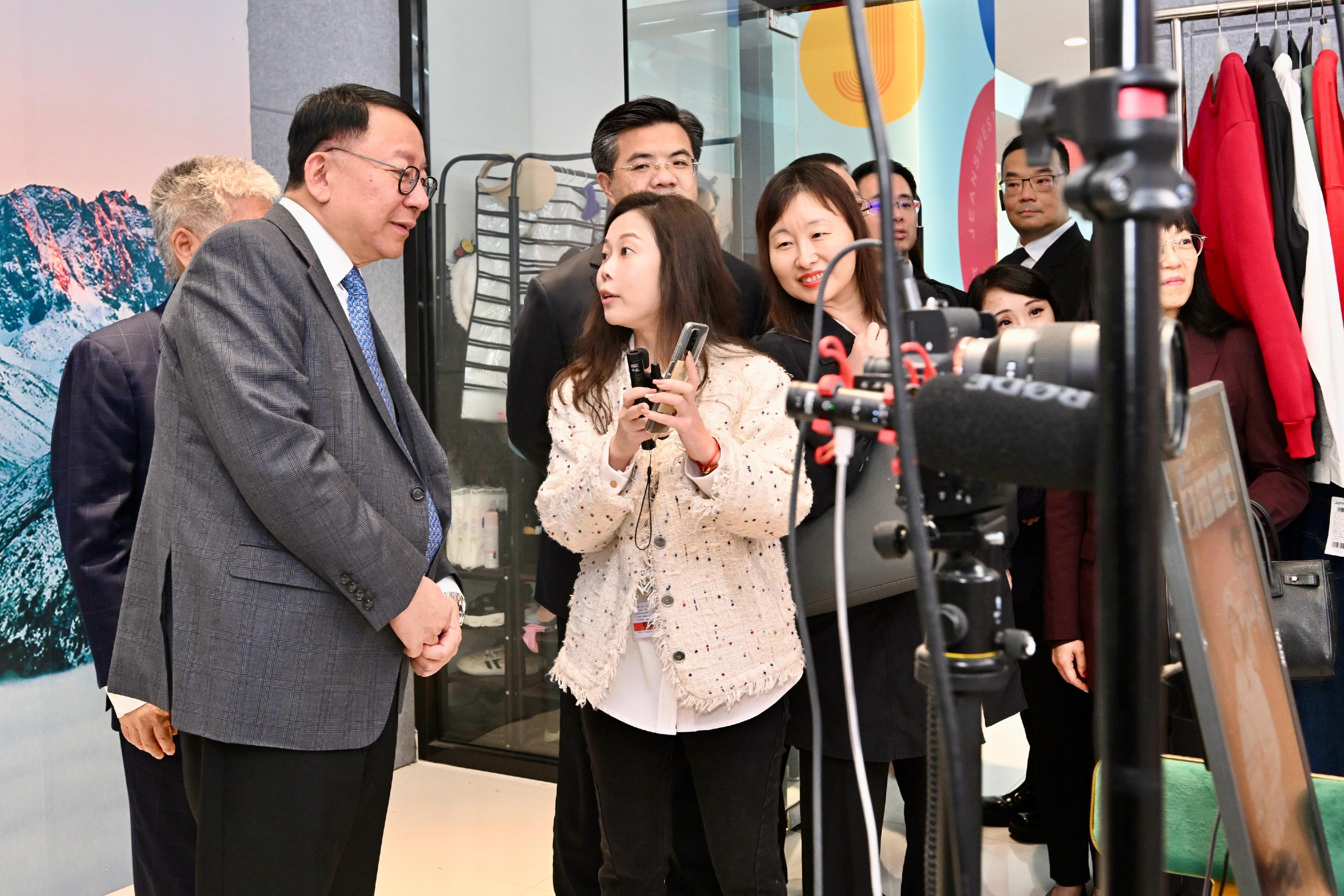 The Chief Secretary for Administration, Mr Chan Kwok-ki, continued his visit to Mainland cities of the Guangdong-Hong Kong-Macao Greater Bay Area in Guangzhou and Huizhou today (January 9).  Photo shows Mr Chan (first left) touring a live streaming studio at the Glorious Sun Group in Huizhou.