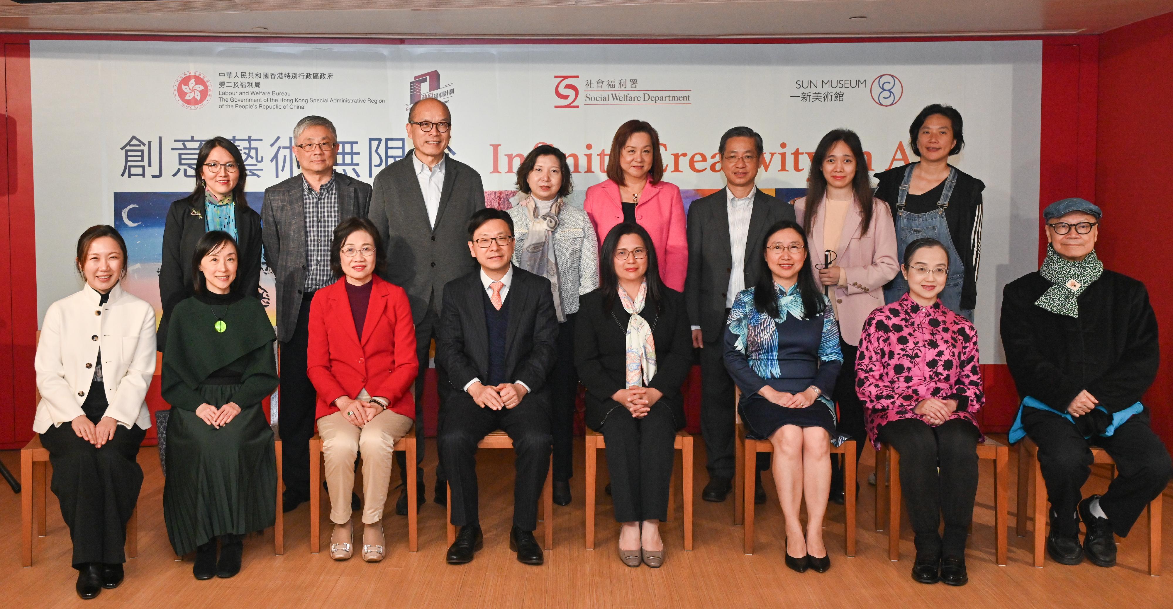 The Opening Ceremony of the "Infinite Creativity in Art" Exhibition, jointly organised by the Labour and Welfare Bureau, the Social Welfare Department (SWD), the Arts Development Fund for Persons with Disabilities (the Arts Fund) and Sun Museum, was held today (January 11). Photo shows guests with the Vice-chairman of the Rehabilitation Advisory Committee, Dr Kevin Lau (back row, third left); the Chairperson of the Management Committee of the Arts Fund and Assistant Director (Rehabilitation and Medical Social Services) of the SWD, Ms Maggie Leung (back row, fourth left); the Chairperson of the Grants Sub-committee of the Arts Funds, Ms Teresa Au (back row, fifth left), and other members. 