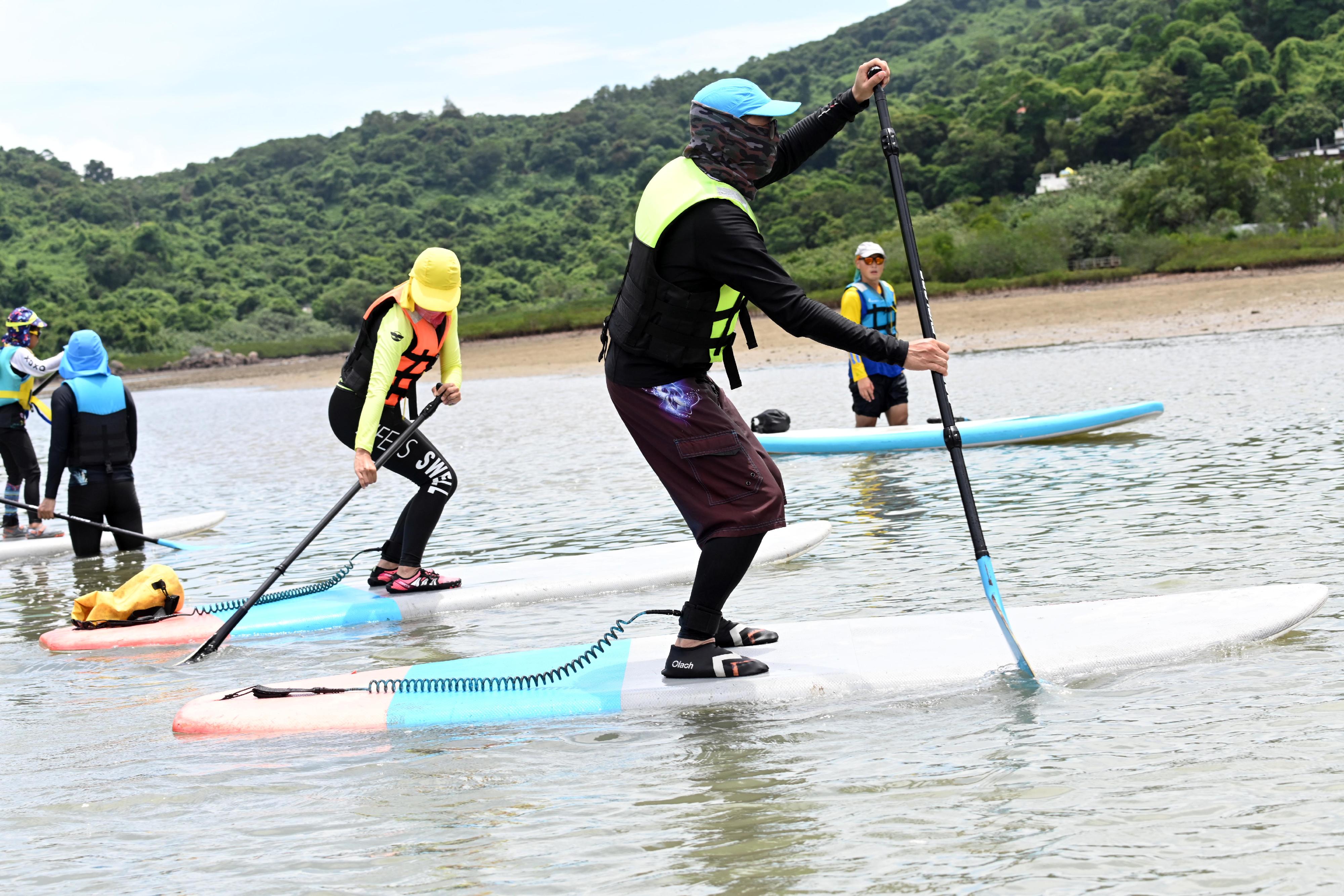 The Leisure and Cultural Services Department announced that applications for the 2024-25 Pilot Scheme on Subvention for New Sports start today (January 15) to promote the development of new sports. Photo shows "Standup Paddle, which is a new sport subvented by the scheme earlier.