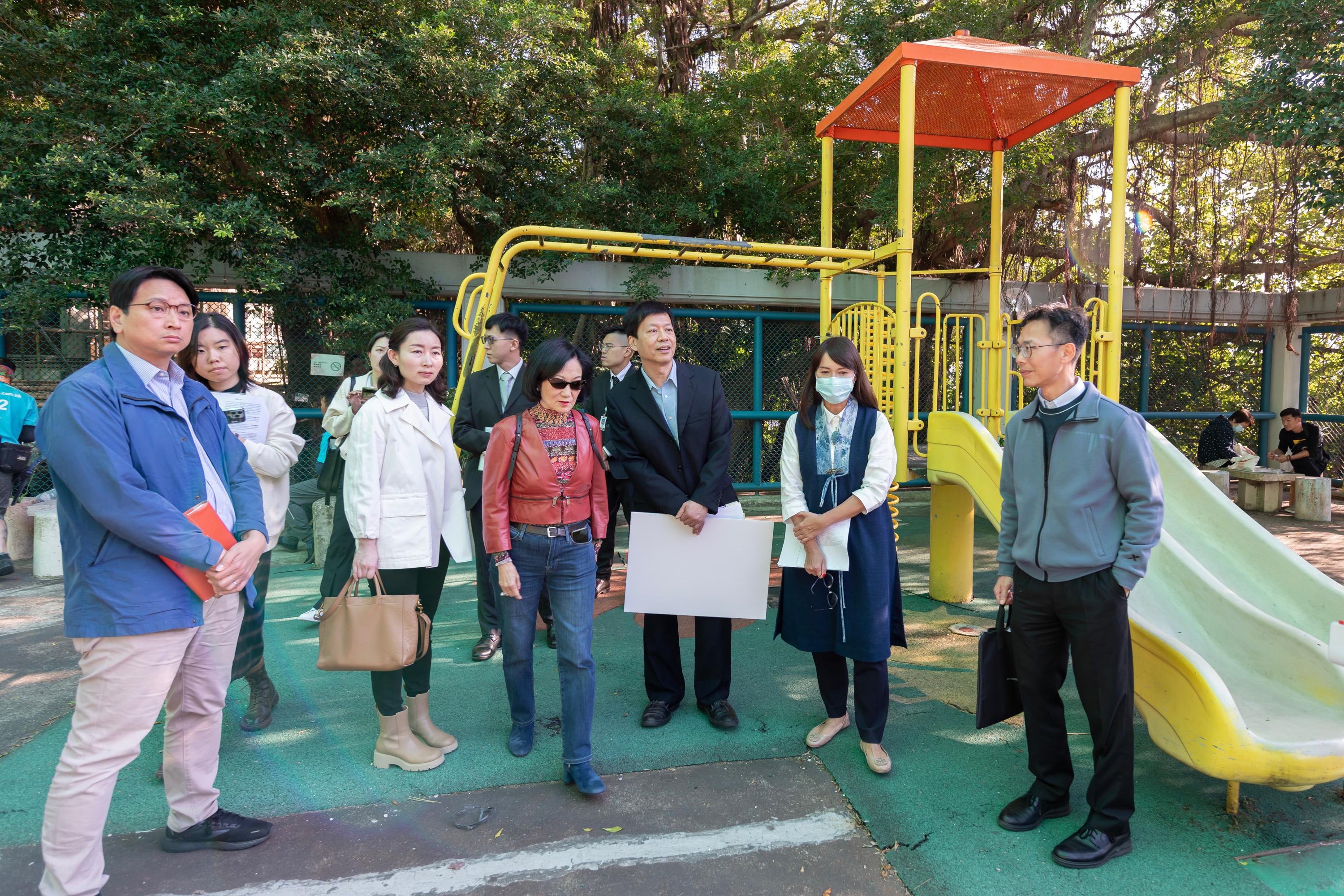 Legislative Council Members visited two Home Ownership Scheme courts today (January 15) to follow up on issues raised by a deputation relating to the community facilities therein upon the divestment of properties by the Housing Authority to Link Real Estate Investment Trust. Photo shows Members visiting the playground in Sui Wo Court.