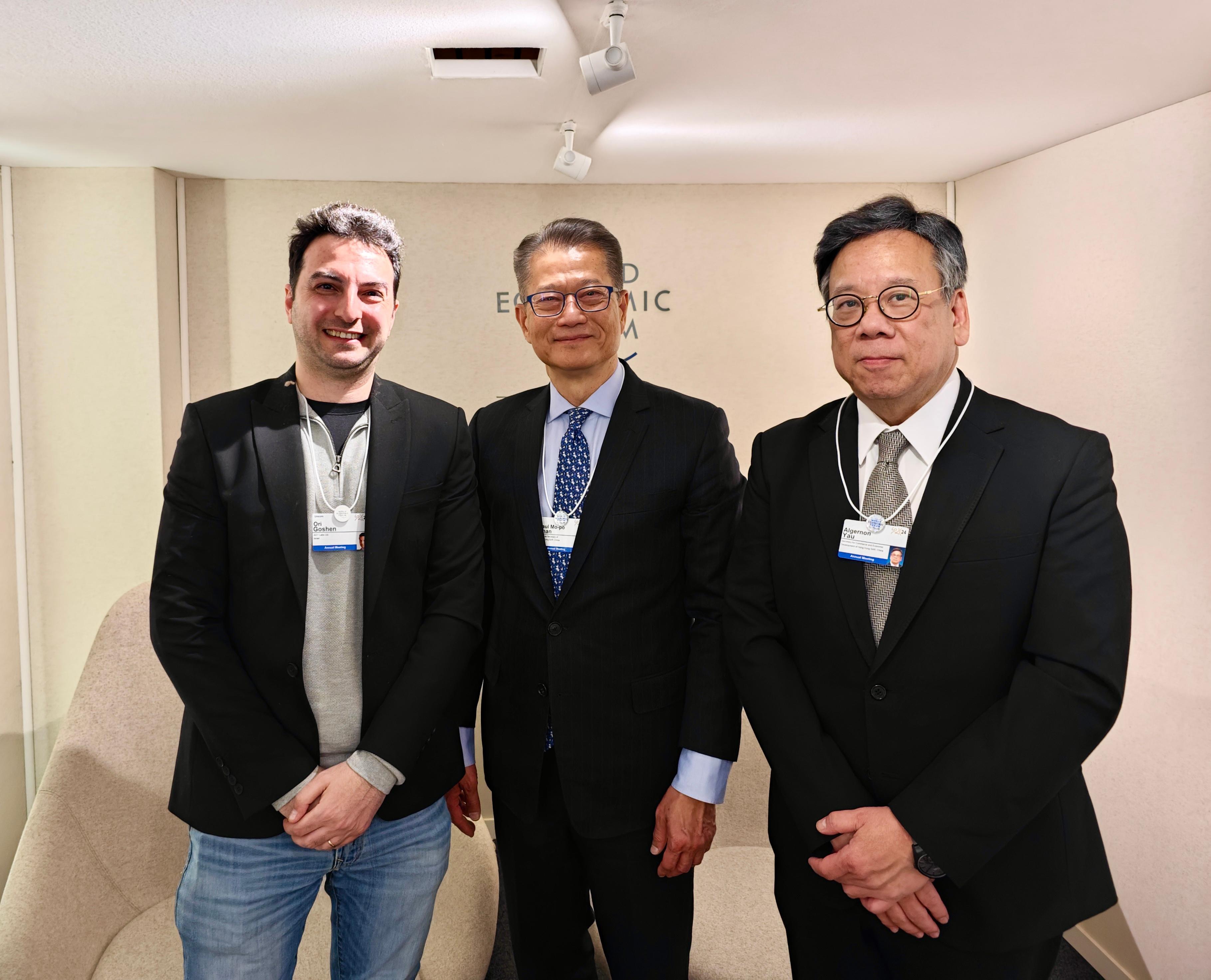The Financial Secretary, Mr Paul Chan (centre) and the Secretary for Commerce and Economic Development, Mr Algernon Yau (right), meets with Co-Founder and Co-Chief Executive Officer of artificial intelligence company AI21 Labs, Mr Ori Goshen (left), on January 15 (Davos time) during the World Economic Forum Annual Meeting at Davos, Switzerland.