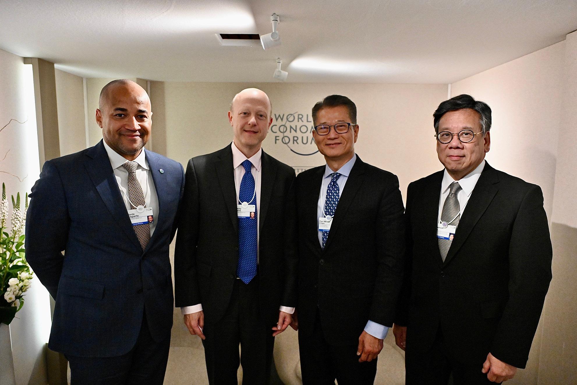 The Financial Secretary, Mr Paul Chan (second right) and the Secretary for Commerce and Economic Development, Mr Algernon Yau (first right), meets with the Co-Founder, Chairman and Chief Executive Officer of stablecoin issuer Circle Internet Financial, Mr Jeremy Allaire (second left) , on January 15 (Davos time) during the World Economic Forum Annual Meeting at Davos, Switzerland.