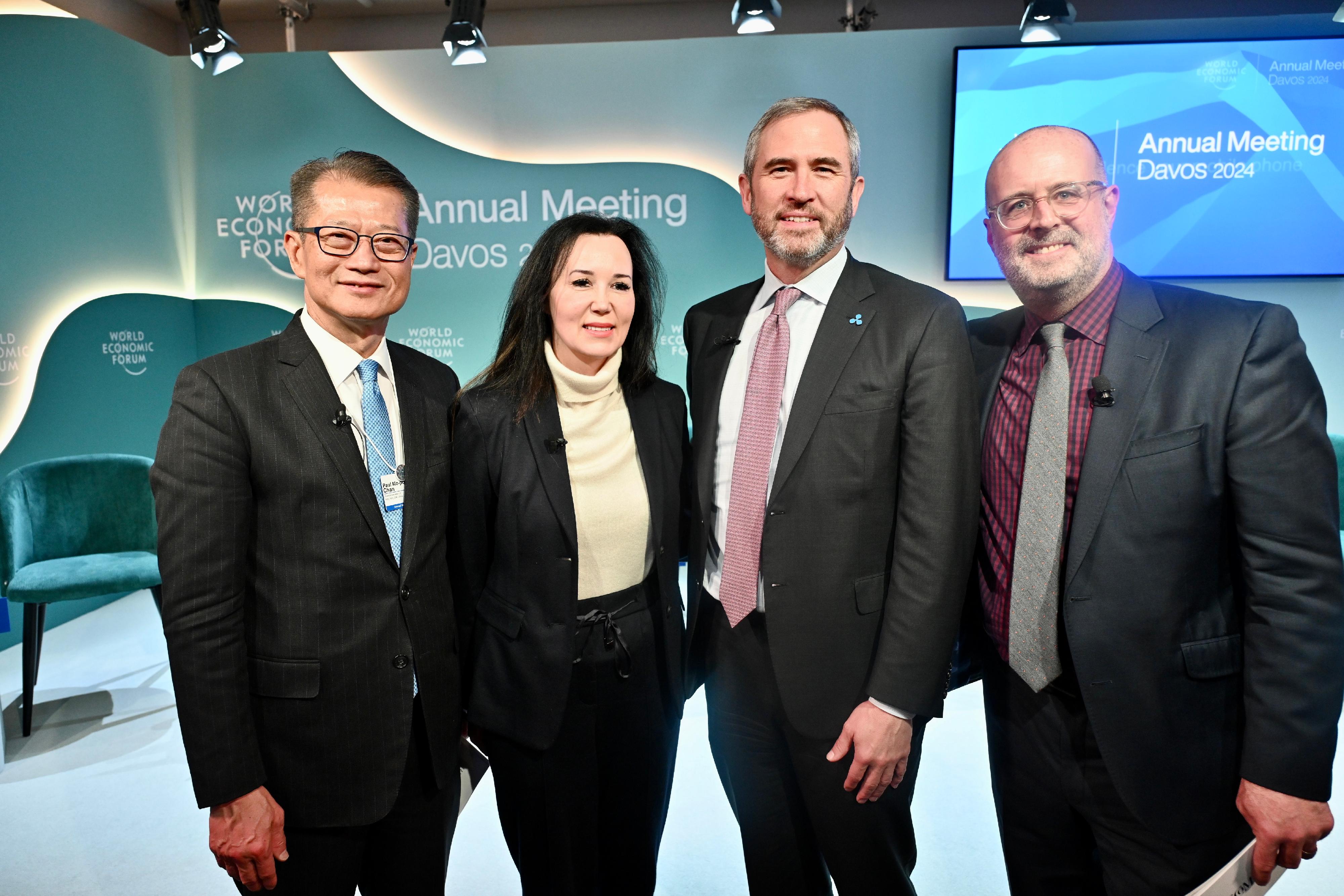 The Financial Secretary, Mr Paul Chan, participated in a thematic discussion session on digital assets at the World Economic Forum Annual Meeting at Davos, Switzerland, yesterday (January 18, Davos time). Photo shows Mr Chan (first left) with other speakers.