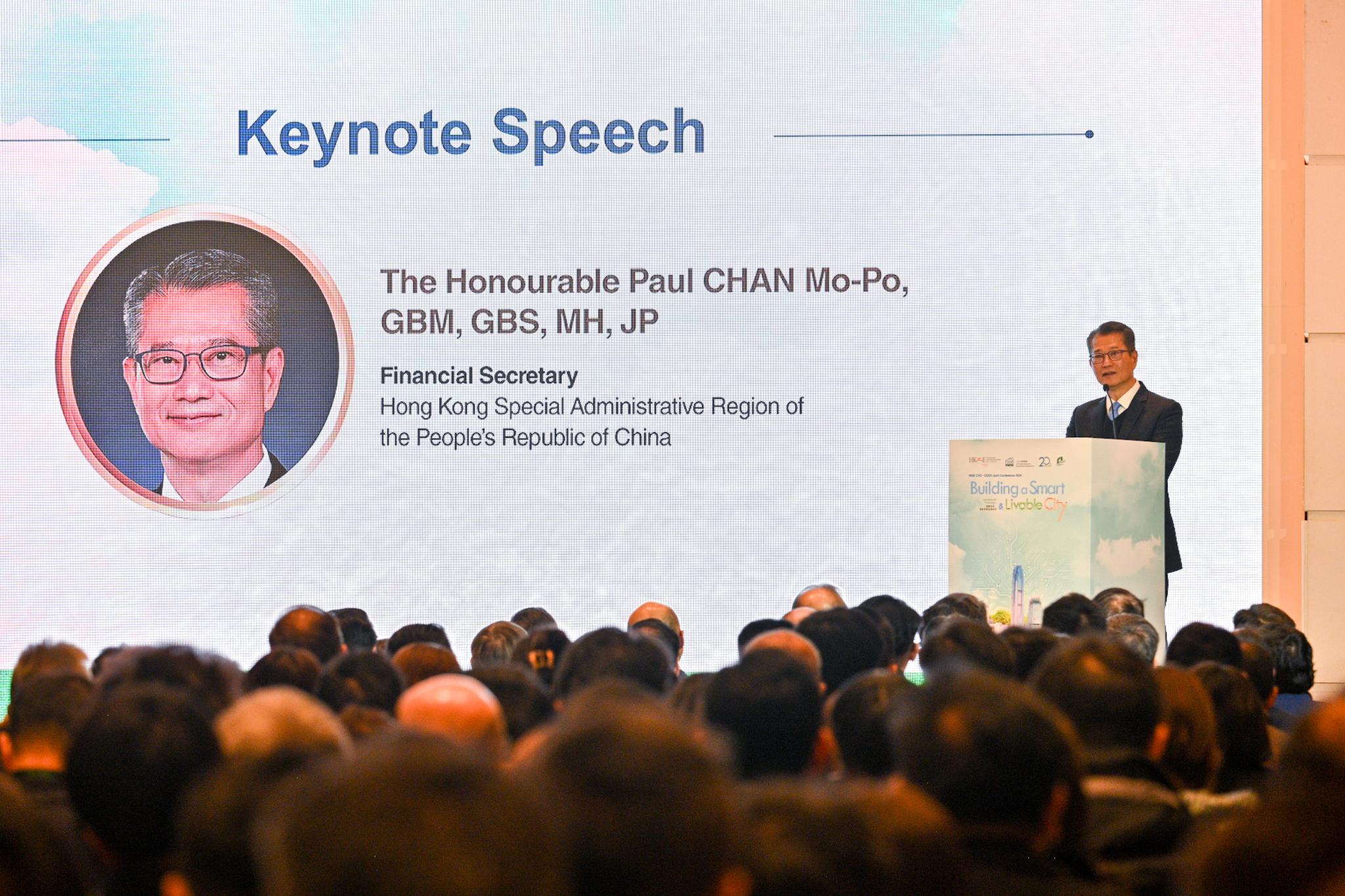 The Financial Secretary, Mr Paul Chan, speaks at the Innovation and Technology: Building a Smart and Livable City Conference 2024 today (January 24).