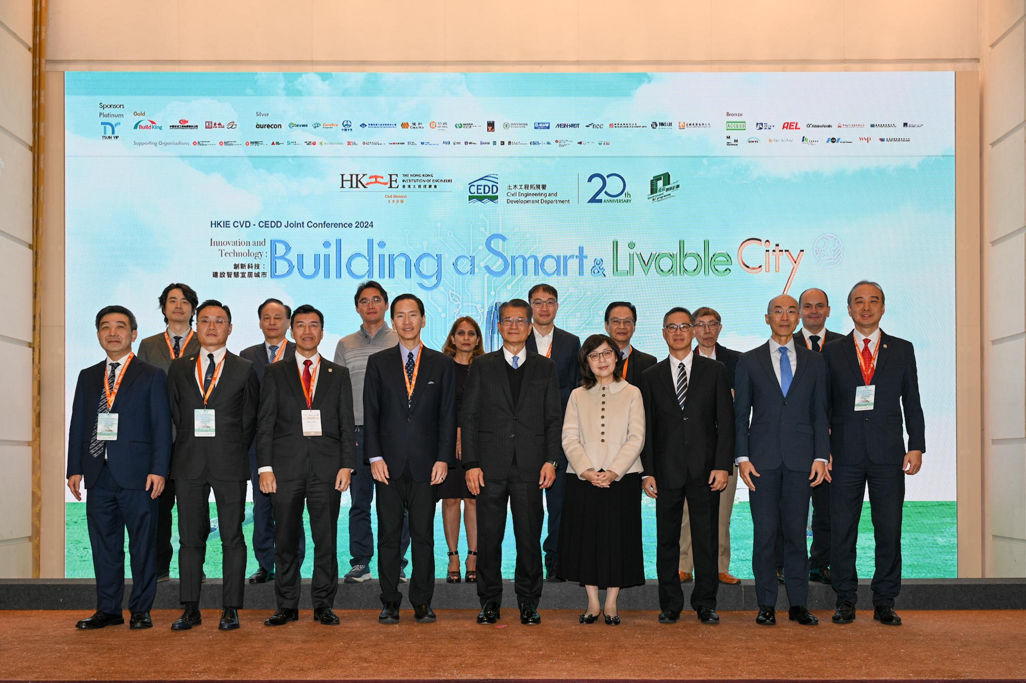 The Financial Secretary, Mr Paul Chan, attended the Innovation and Technology: Building a Smart and Livable City Conference 2024 today (January 24). Photo shows (front row, from fourth left) the Chairman of M Plus Museum Limited, the Chairman of Tai Kwun Culture & Arts Co Ltd and the Vice Chairman of Board of the West Kowloon Cultural District Authority, Mr Bernard Chan; Mr Paul Chan; the Secretary for Development, Ms Bernadette Linn; and other guests at the ceremony.