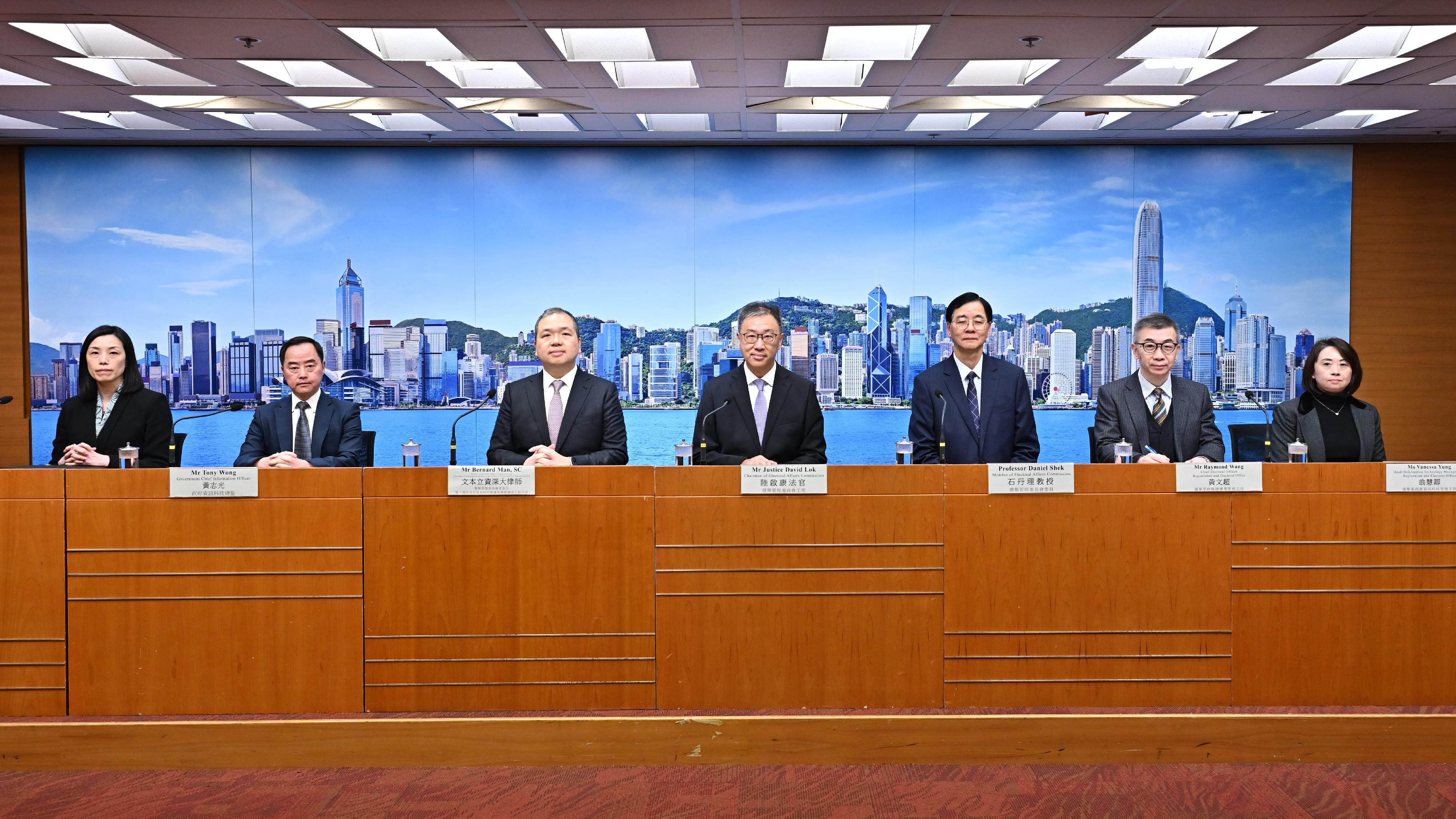 The Chairman of the Electoral Affairs Commission (EAC), Mr Justice David Lok, today (January 26) hosted a press conference to explain the findings of the investigation into the failure of the Electronic Poll Register system in the 2023 District Council Ordinary Election. Photo shows (from left) the Chief Superintendent of the Cyber Security and Technology Crime Bureau of the Hong Kong Police Force, Ms Kelly Cheng; the Government Chief Information Officer, Mr Tony Wong; EAC member and Chairman of the Investigation Group on the Failure of Electronic Poll Register System, Mr Bernard Man, SC; Mr Justice Lok; EAC member Professor Daniel Shek; the Chief Electoral Officer of the Registration and Electoral Office, Mr Raymond Wang; and the Head (Information Technology Management) of the Registration and Electoral Office, Ms Vanessa Yung.