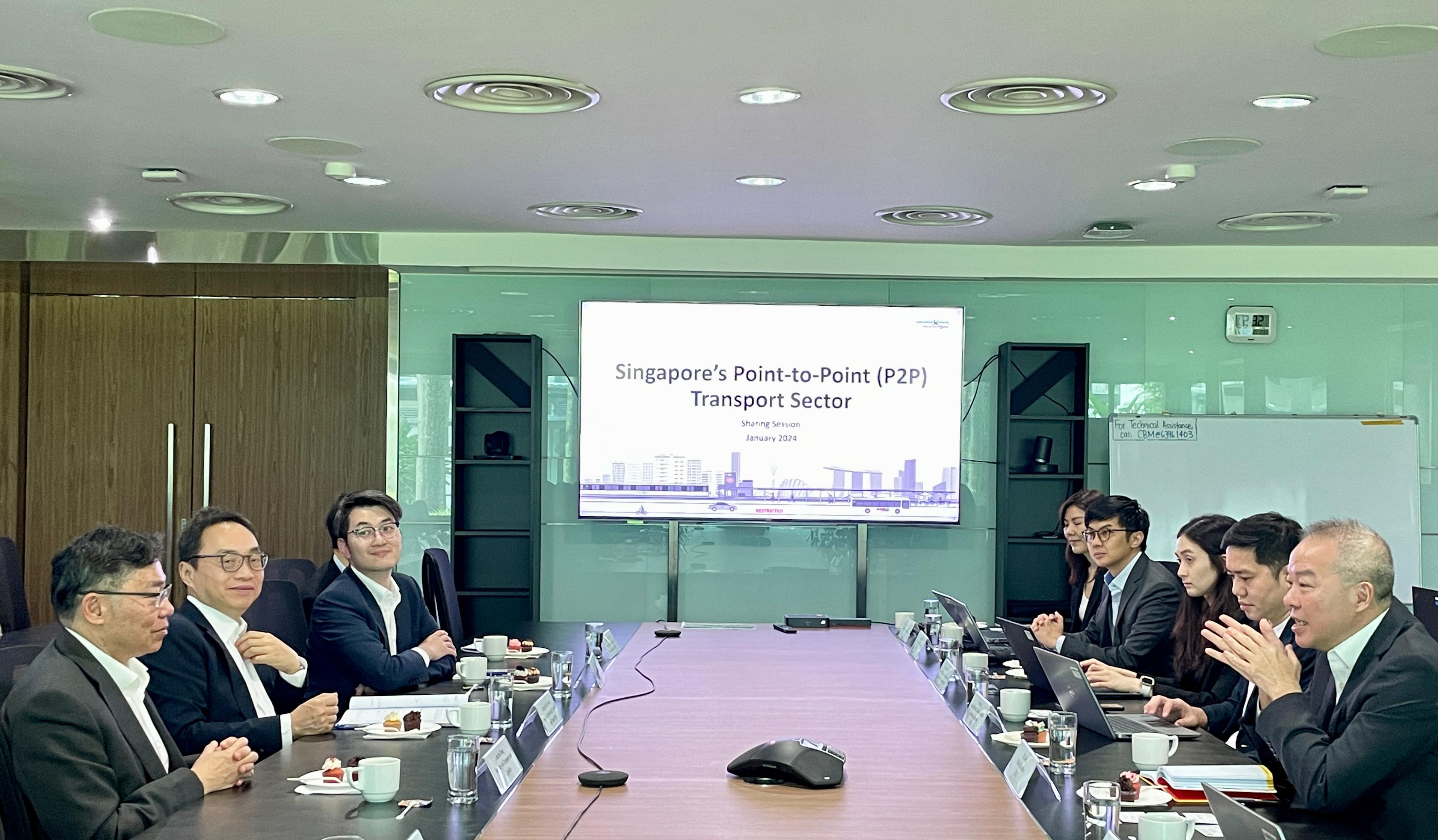 The Secretary for Transport and Logistics, Mr Lam Sai-hung, began his visit programme to Singapore today (January 30). Photo shows Mr Lam (first left) meeting with the Chief Executive of the Land Transport Authority of Singapore, Mr Ng Lang (first right), to exchange views on issues of mutual concern.