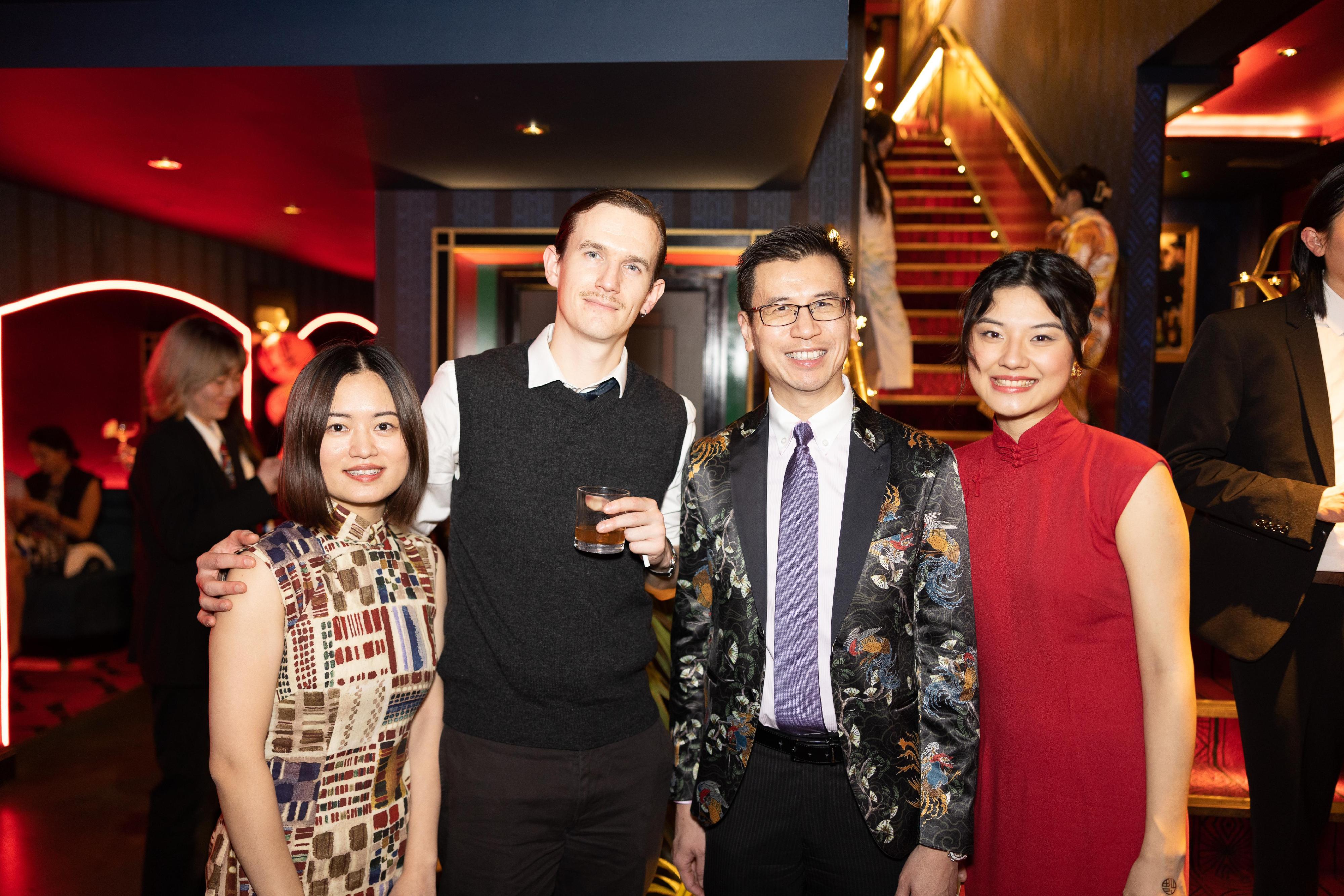 The Hong Kong Economic and Trade Office, London (London ETO)  supported the Chinese Cinema Project in staging an immersive screening of "In the Mood for Love" in London, the United Kingdom, on February 3 (London time) to showcase Hong Kong’s unique culture.  Photo shows （from left) Founder and Lead Curator of the Chinese Cinema Project, Ms Millie Zhou; Head Film Curator at The Garden Cinema, Dr George Crosthwait; the Director-General of London ETO, Mr Gilford Law and Film Curator, Chinese Cinema Project, Ms Yao Tu at the opening screening.